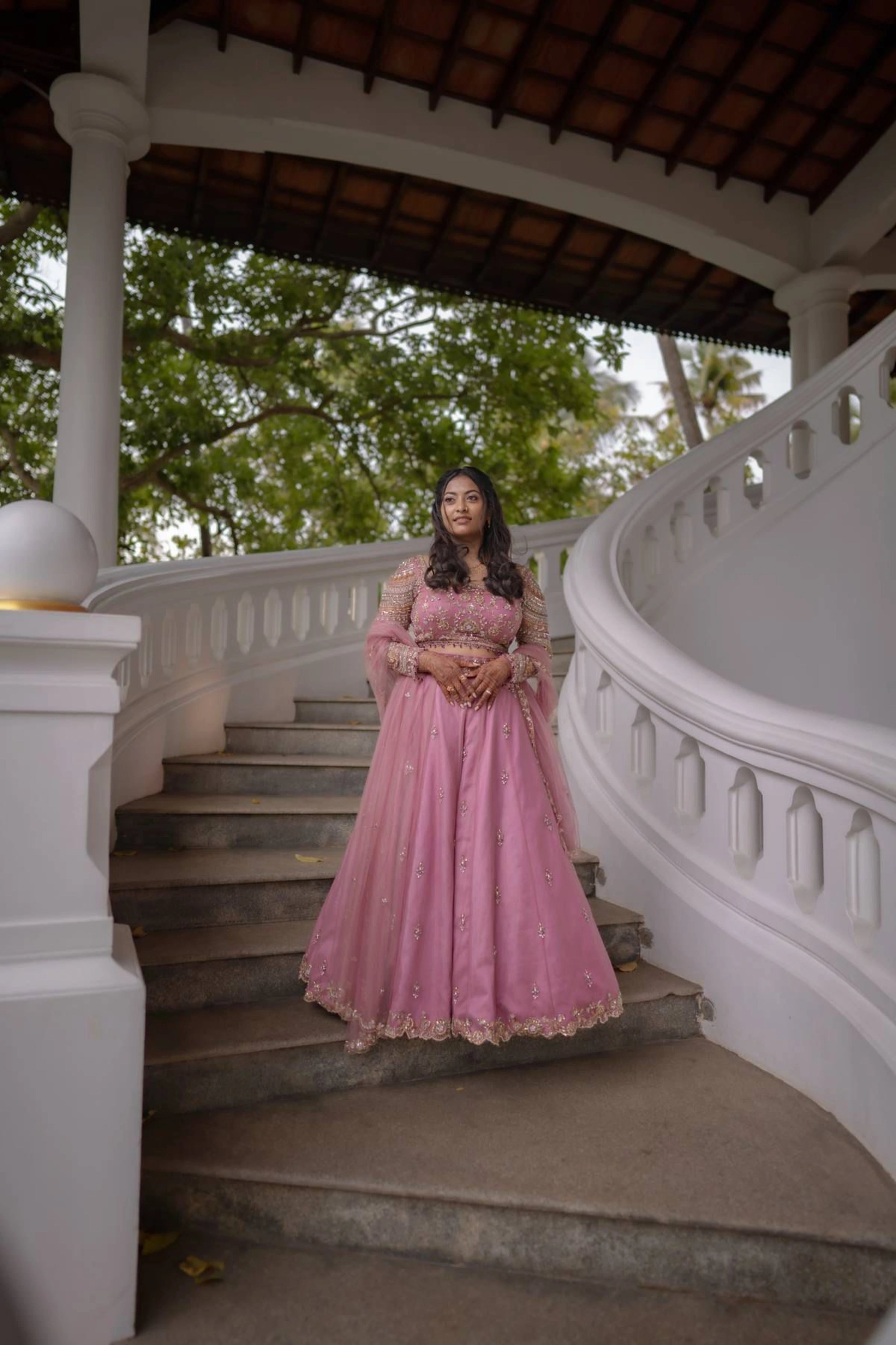 Bride Karoline from Qatar in a lilac tulle lehenga by team Archana Karthick.