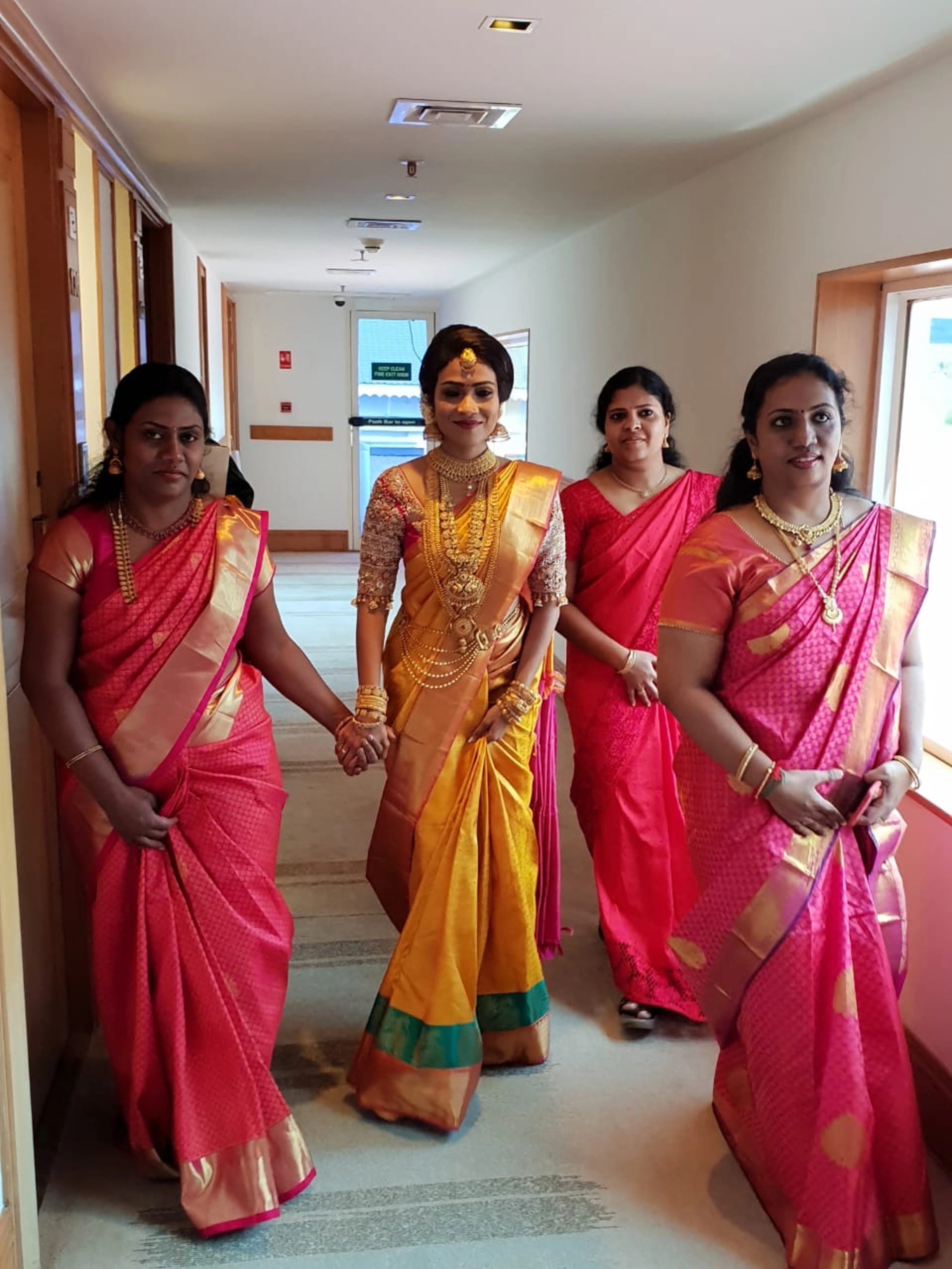 Bride Krishnapriya from Chennai in a pink silk blouse handcrafted intricately with beads, stones, pearls, cutdanas and zardozi by team Archana Karthick.