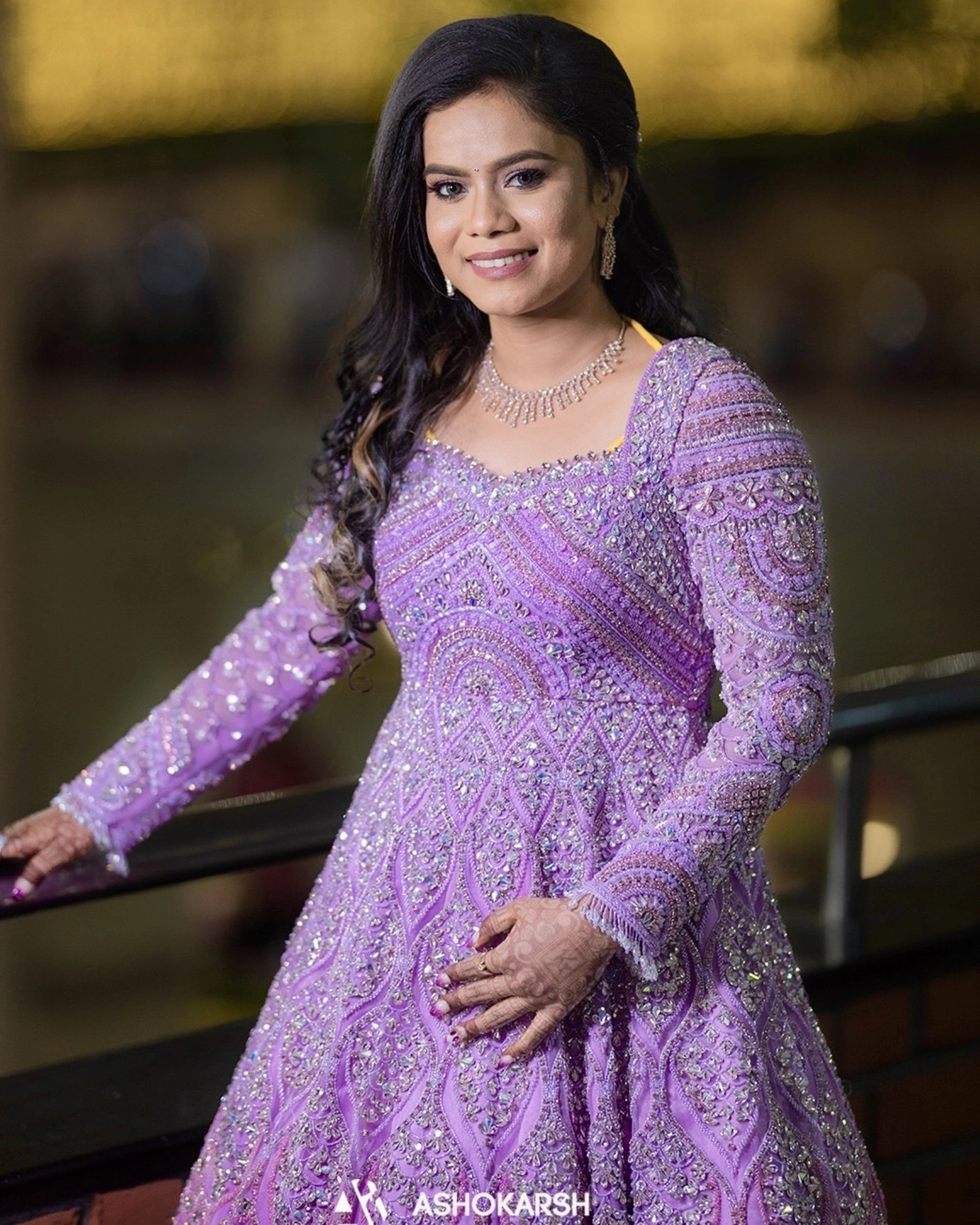 Bride Kushmma in a lilac pink ombre gown by team Archana Karthick