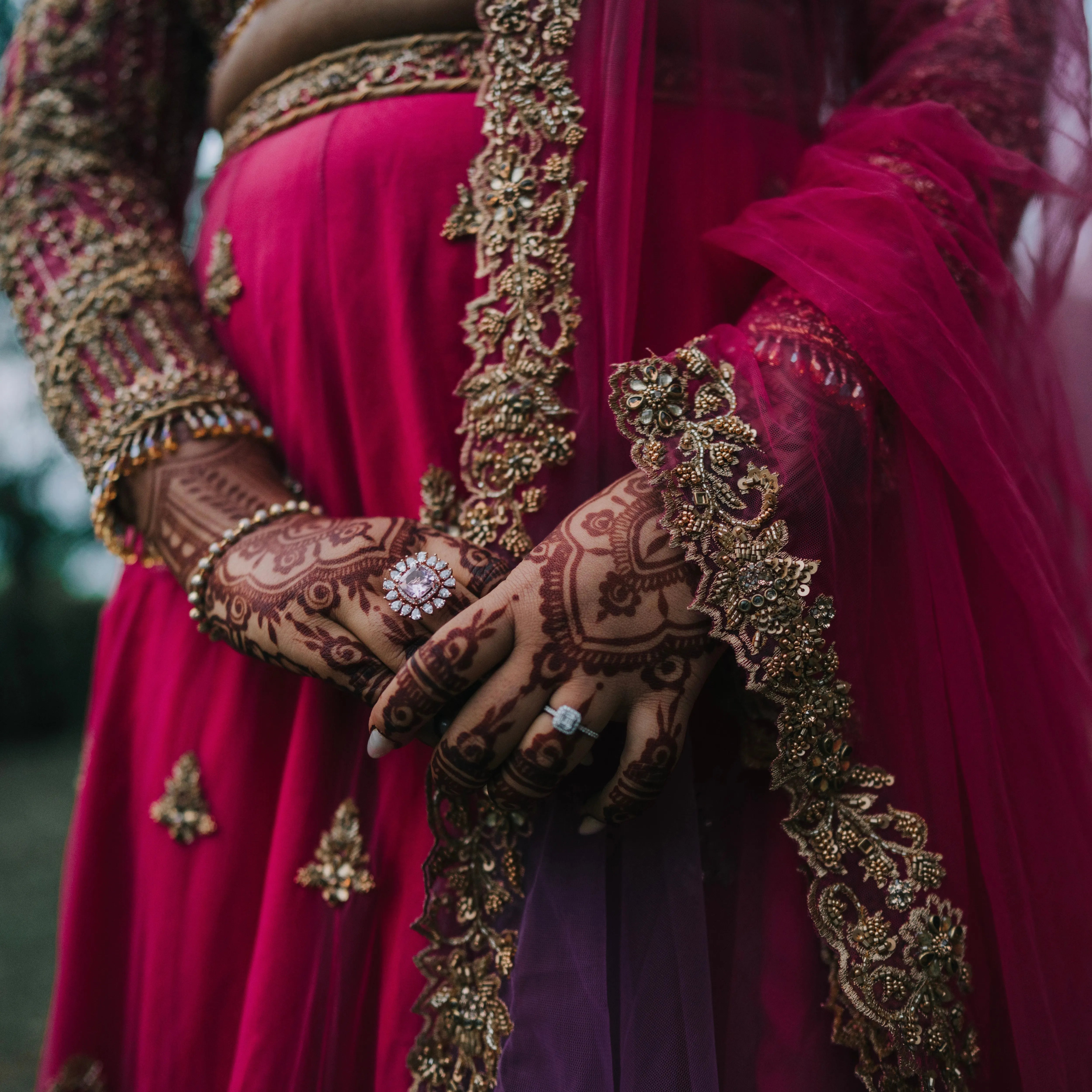 Bride Lalina from Malaysia, posing in a pink & purple ombre lehnega by team Archana Karthick.