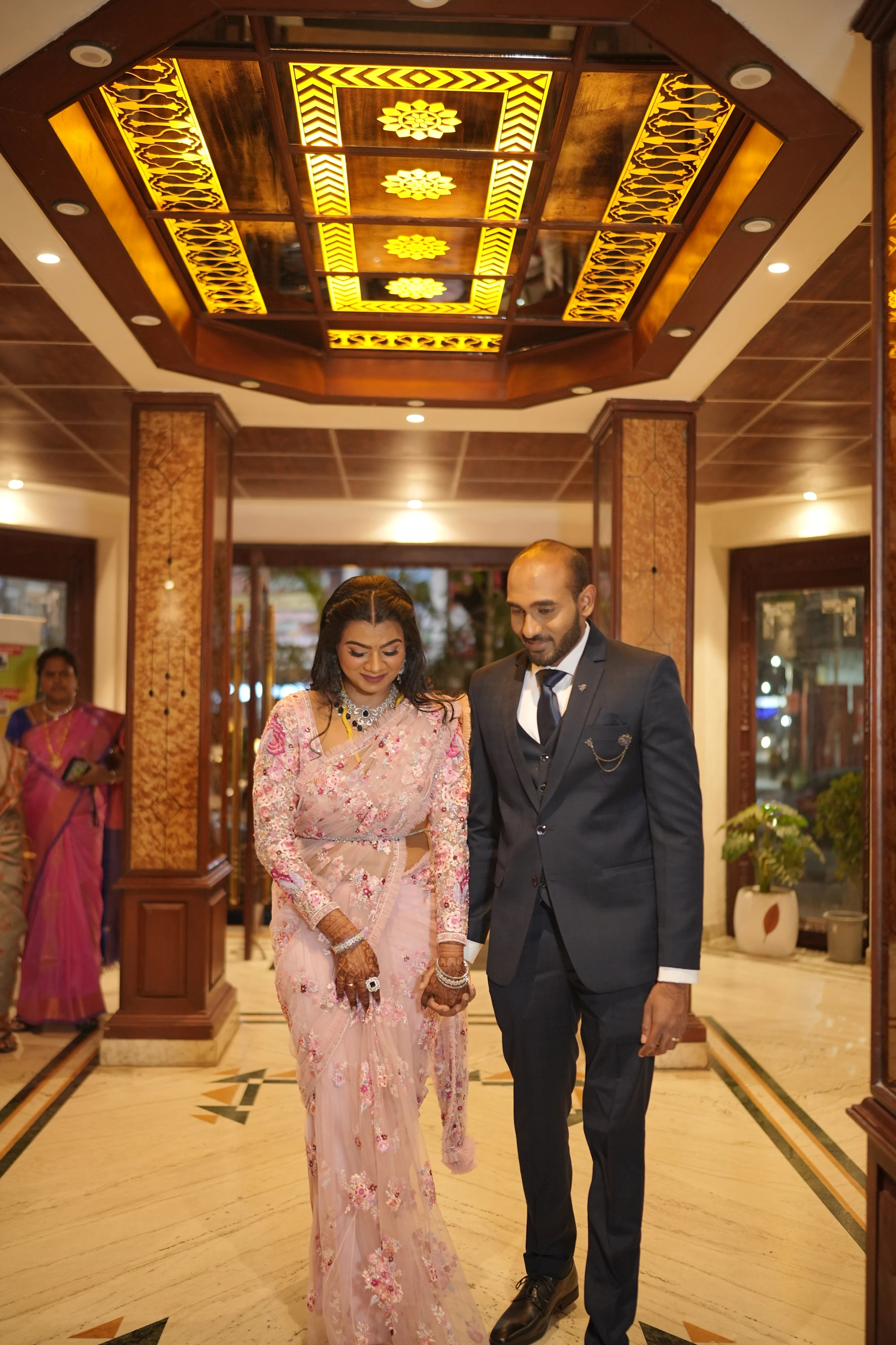 Bride Preethi from Canada in a pink tulle saree, handcrafted by team Archana Karthick.