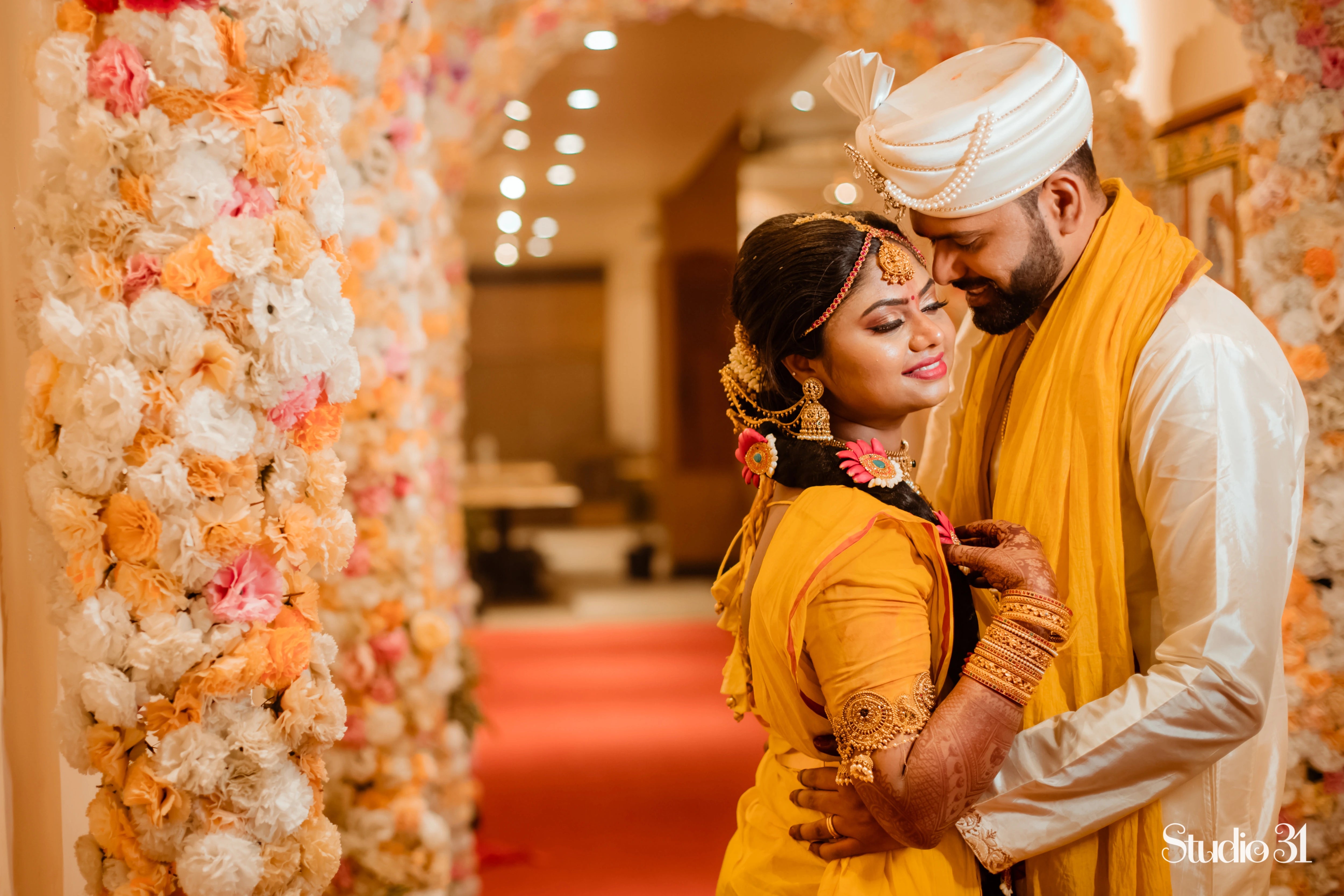 Bride Sailaja from USA in a white blouse which turned yellow, handcrafted by team Archana Karthick.