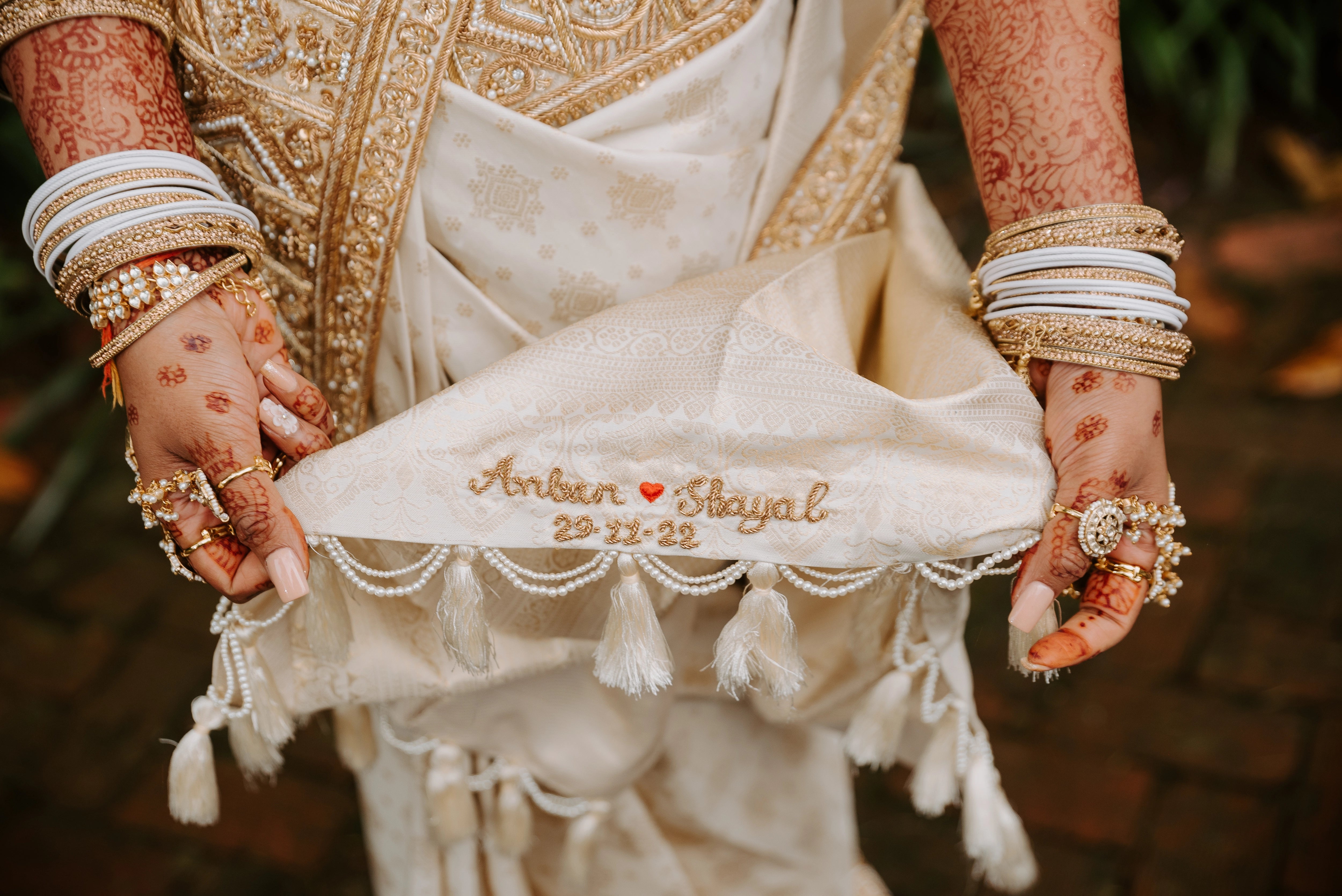 Bride Shayal Raniga showcasing detailings in an ivory silk concept blouse & saree border, intricately handcrafted with zardozi, stones, pearls and coins by team Archana Karthick.