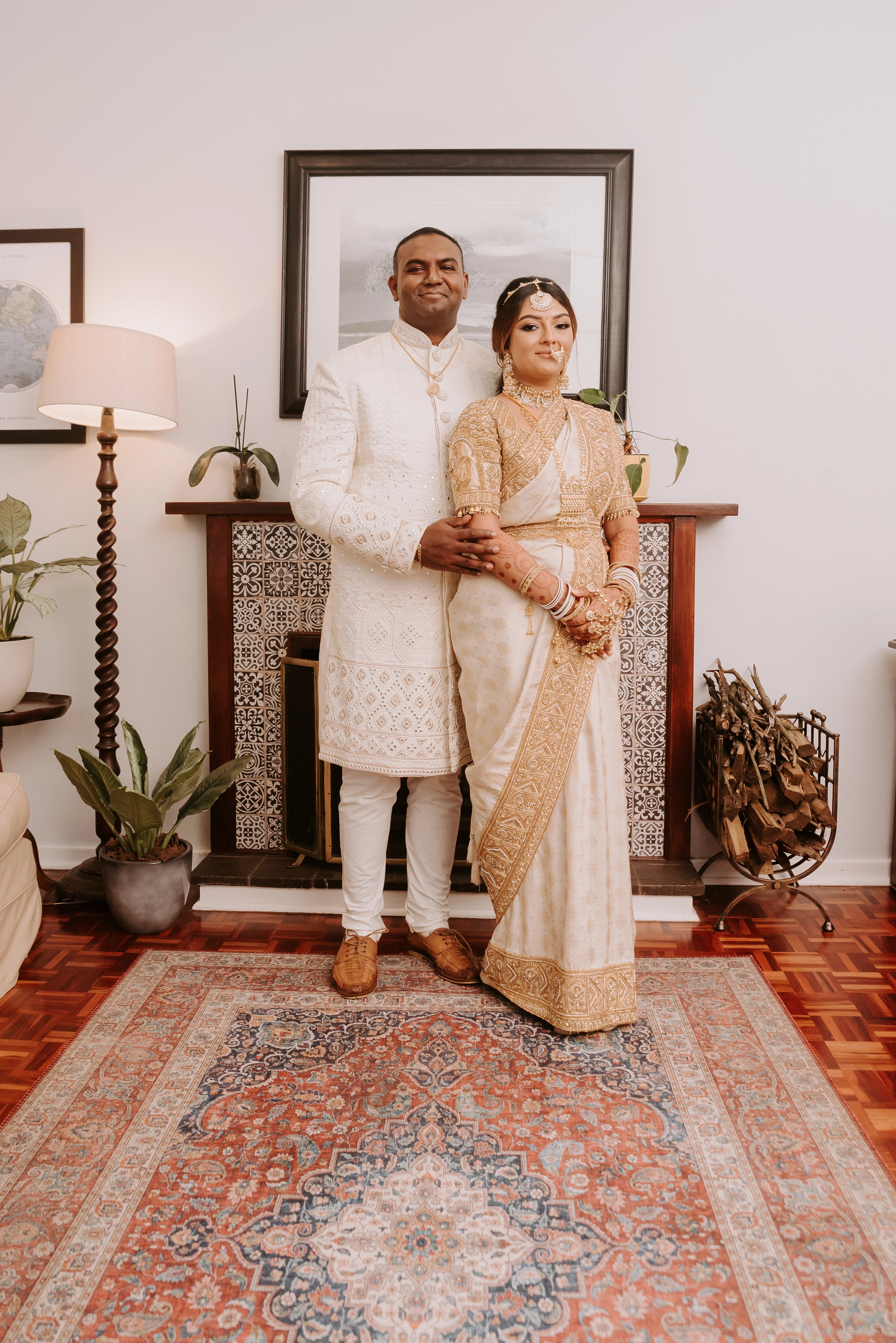 Bride Shayal in the living room in an ivory silk concept blouse & saree border, intricately handcrafted with zardozi, stones, pearls and coins by team Archana Karthick.