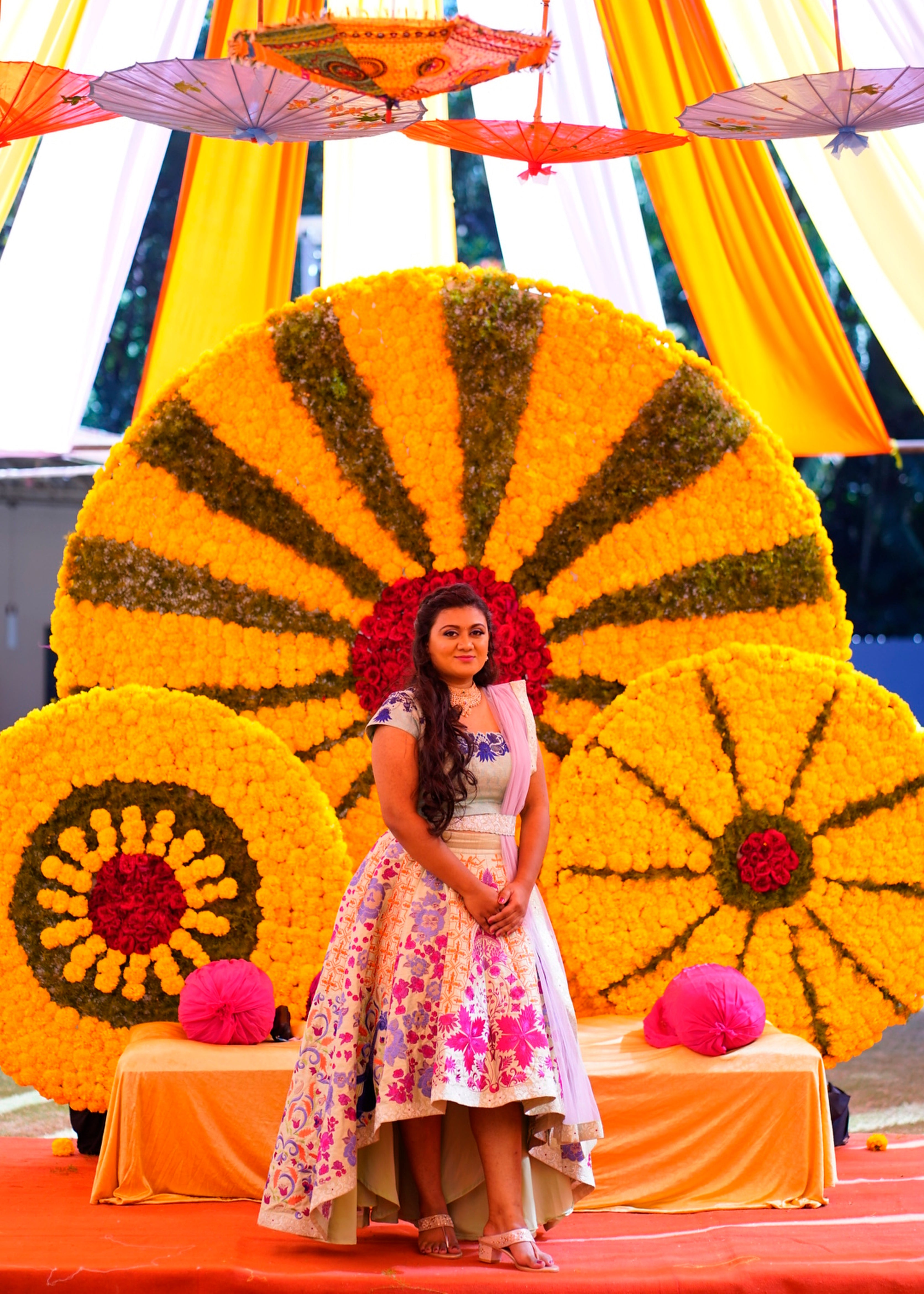 Bride Sowmya Rani from Hyderabad posing for photoshoot in a pastel pistachio green lehenga handcrafted by team Archana Karthick.