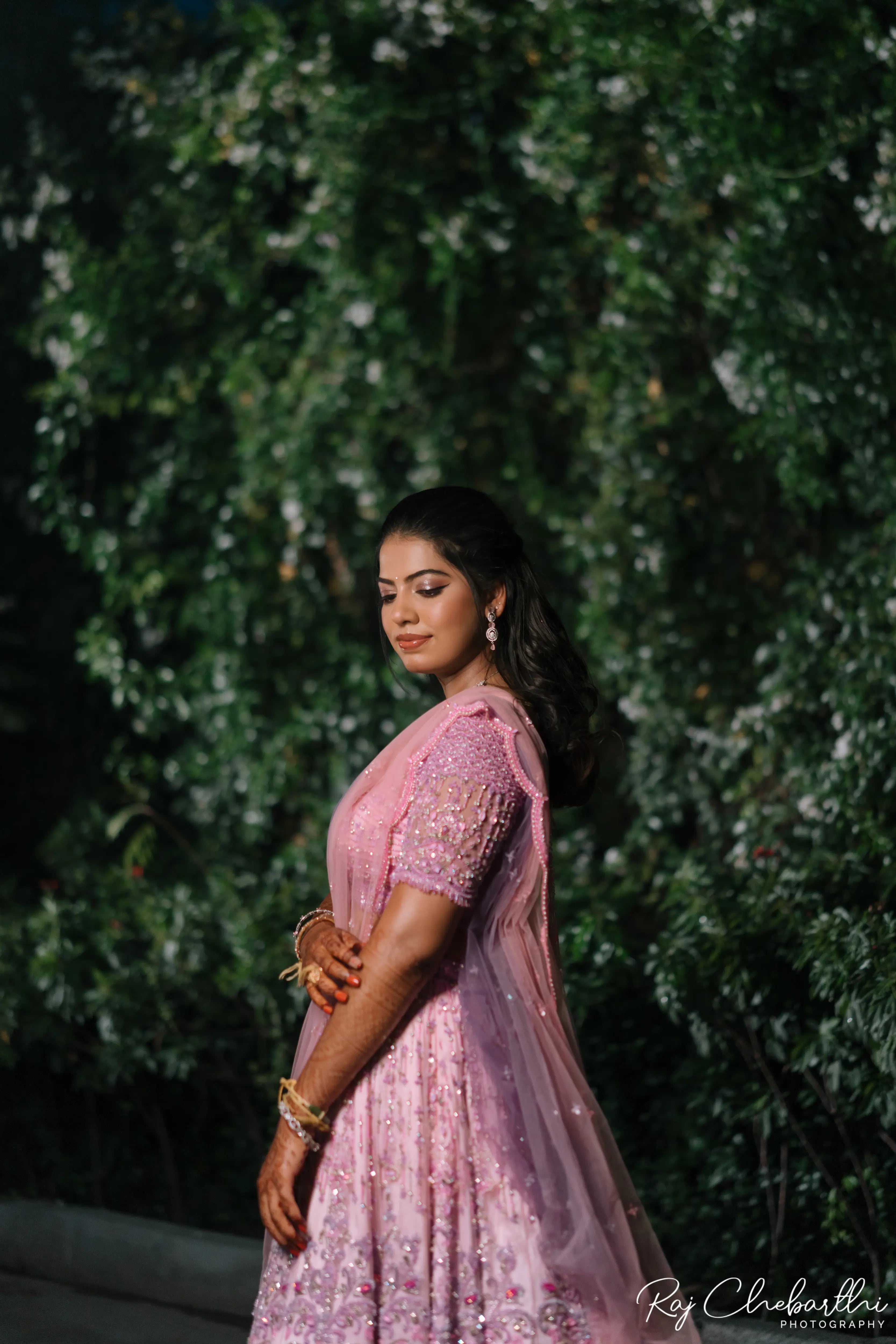 Bride Subhiksha in a lavender-pink lehenga by Archana Karthick