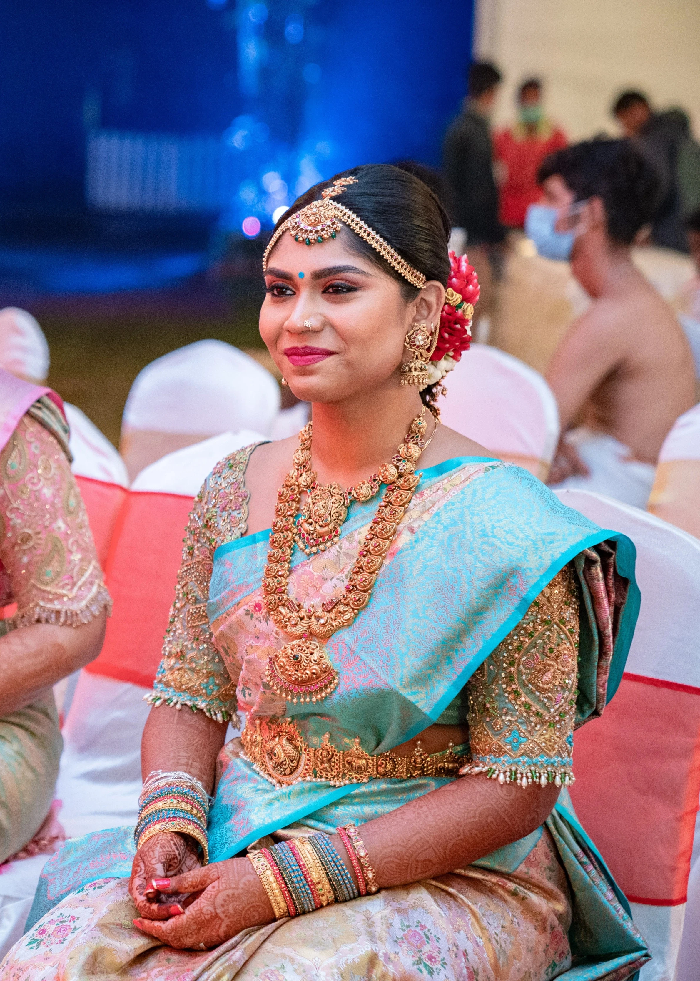 Bride Vidya D in a powder blue silk blouse, handcrafted with beads, zardozi, kundan, resham, stones and crystals by team Archana Karthick.