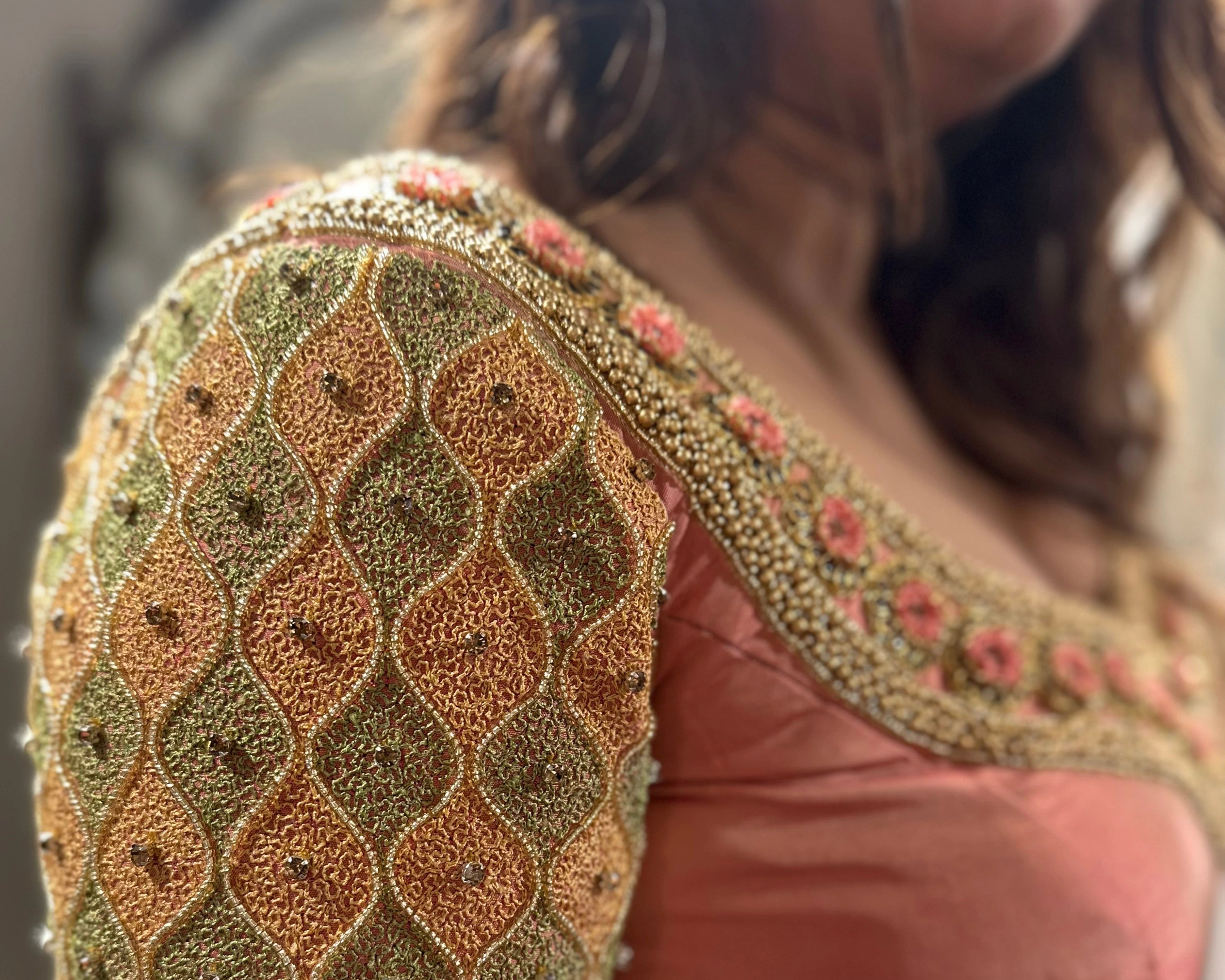 Bride Visali from USA during her fittings in a peach cream raw silk blouse handcrafted by team Archana Karthick.