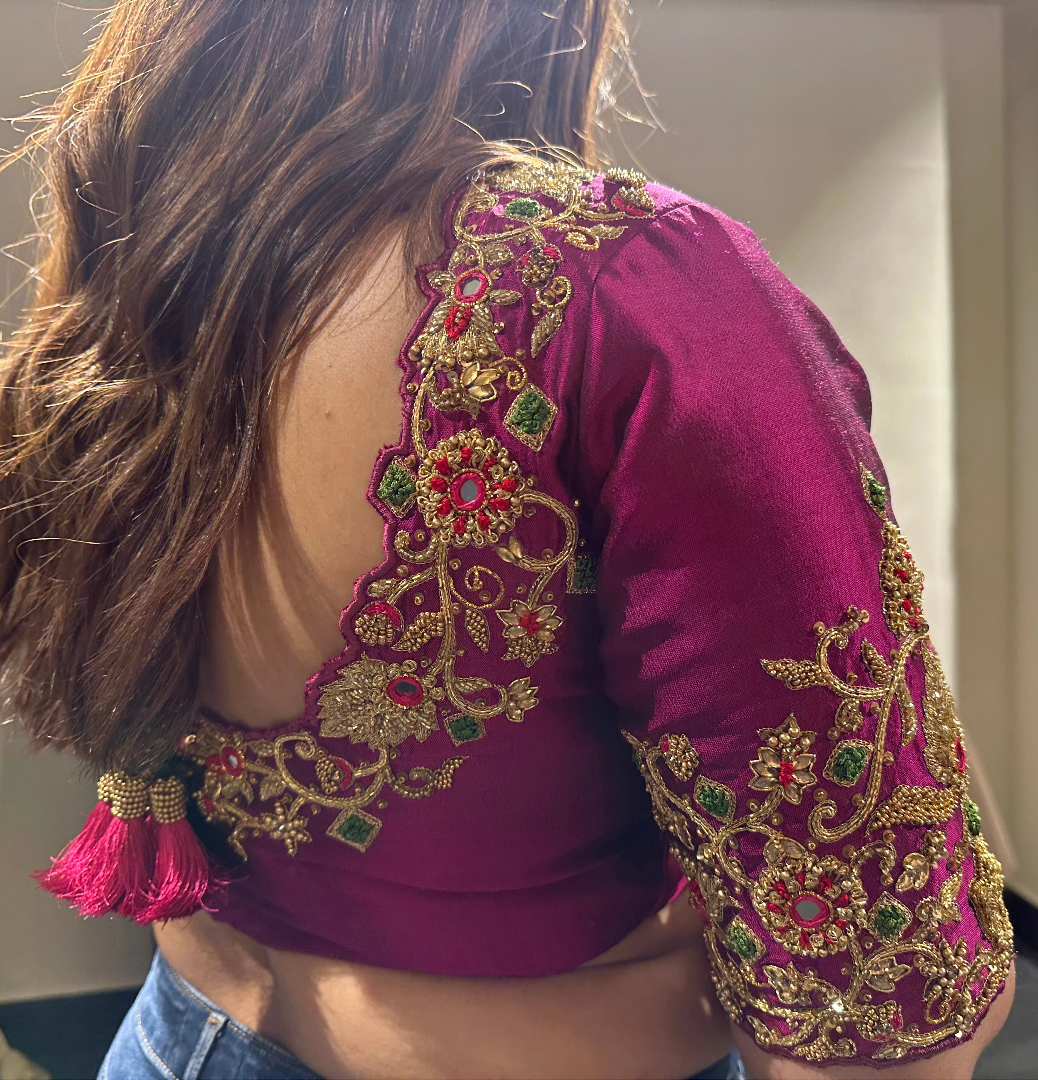 Bride Visali from USA in a magenta raw silk blouse handcrafted by team Archana Karthick.