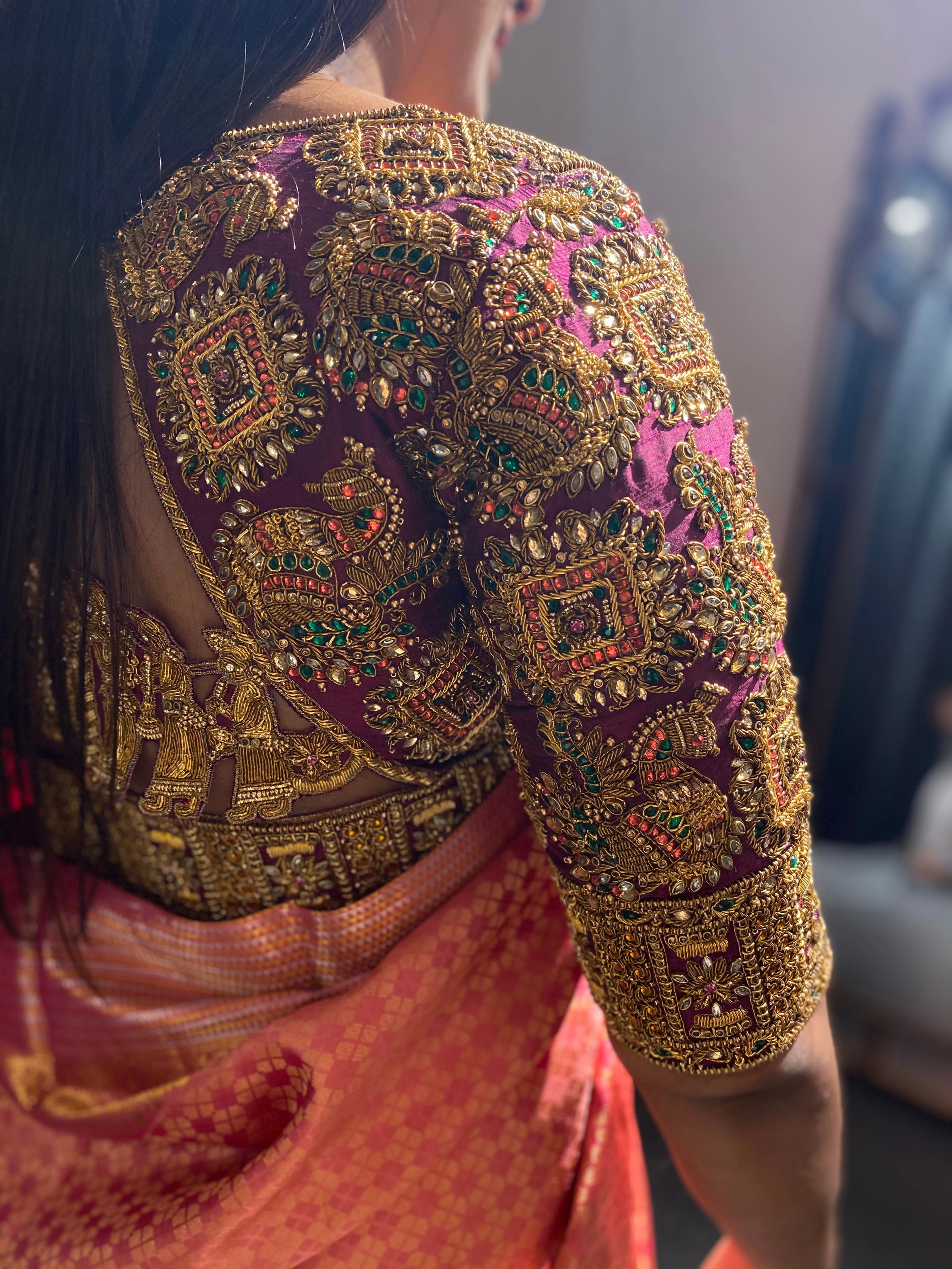 Bride from Buffalo, USA during fittings in a purple raw silk blouse handcrafted by team Archana Karthick.