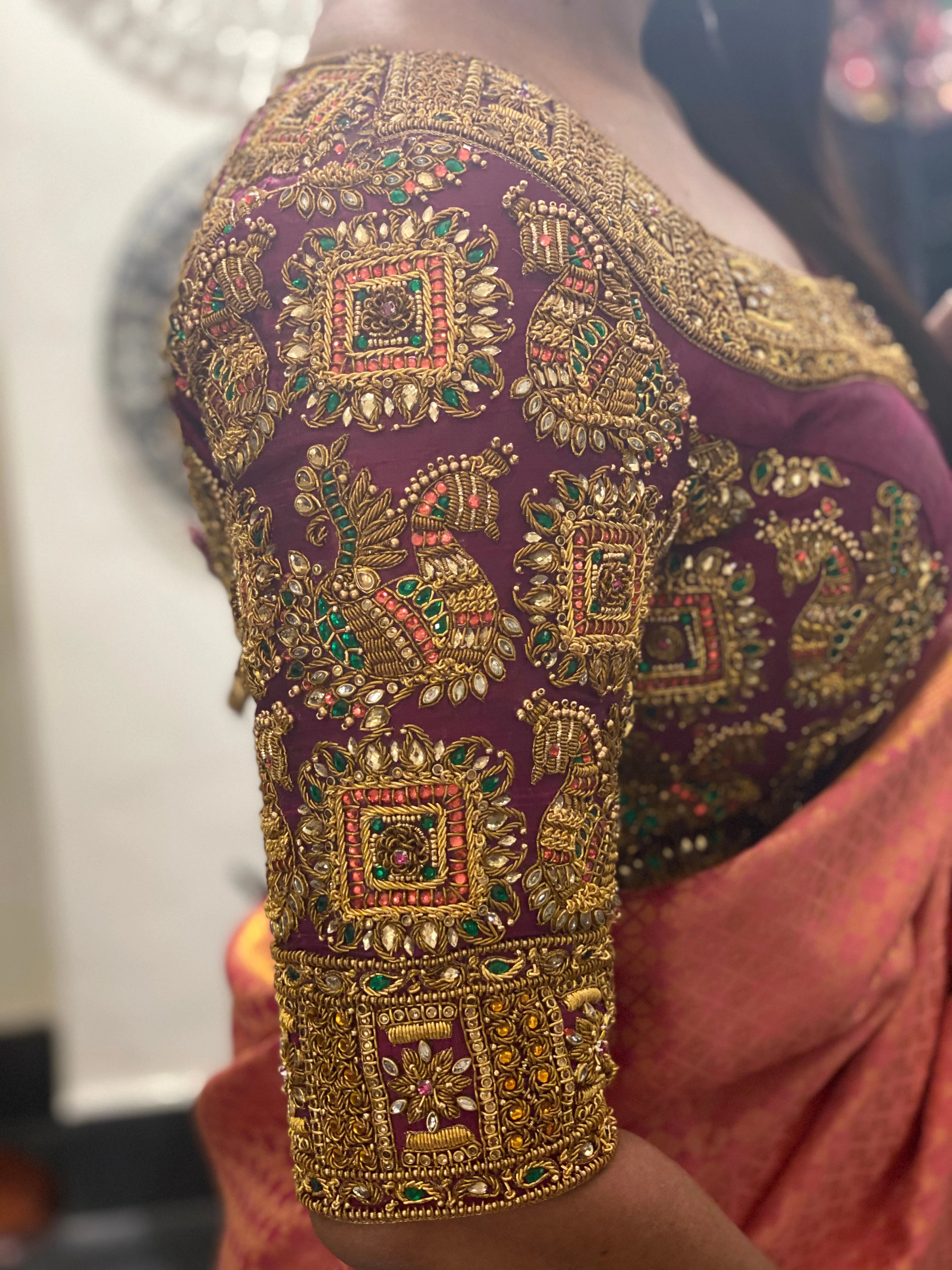 Bride from Buffalo, USA in a purple raw silk blouse handcrafted by team Archana Karthick.