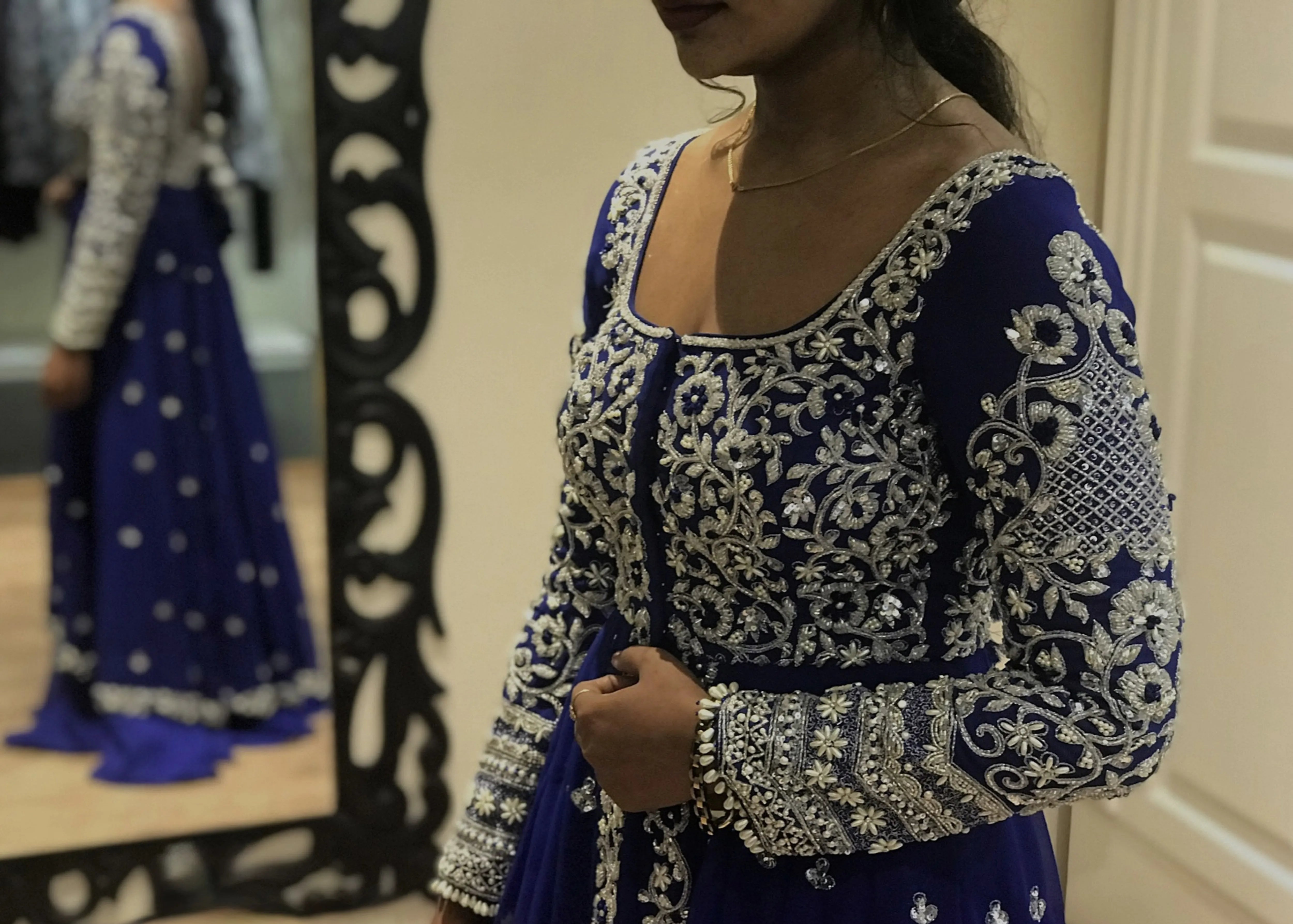 Bride from Chennai for her fittings in navy blue masakali lehenga with silver embellishments designed by Archana Karthick