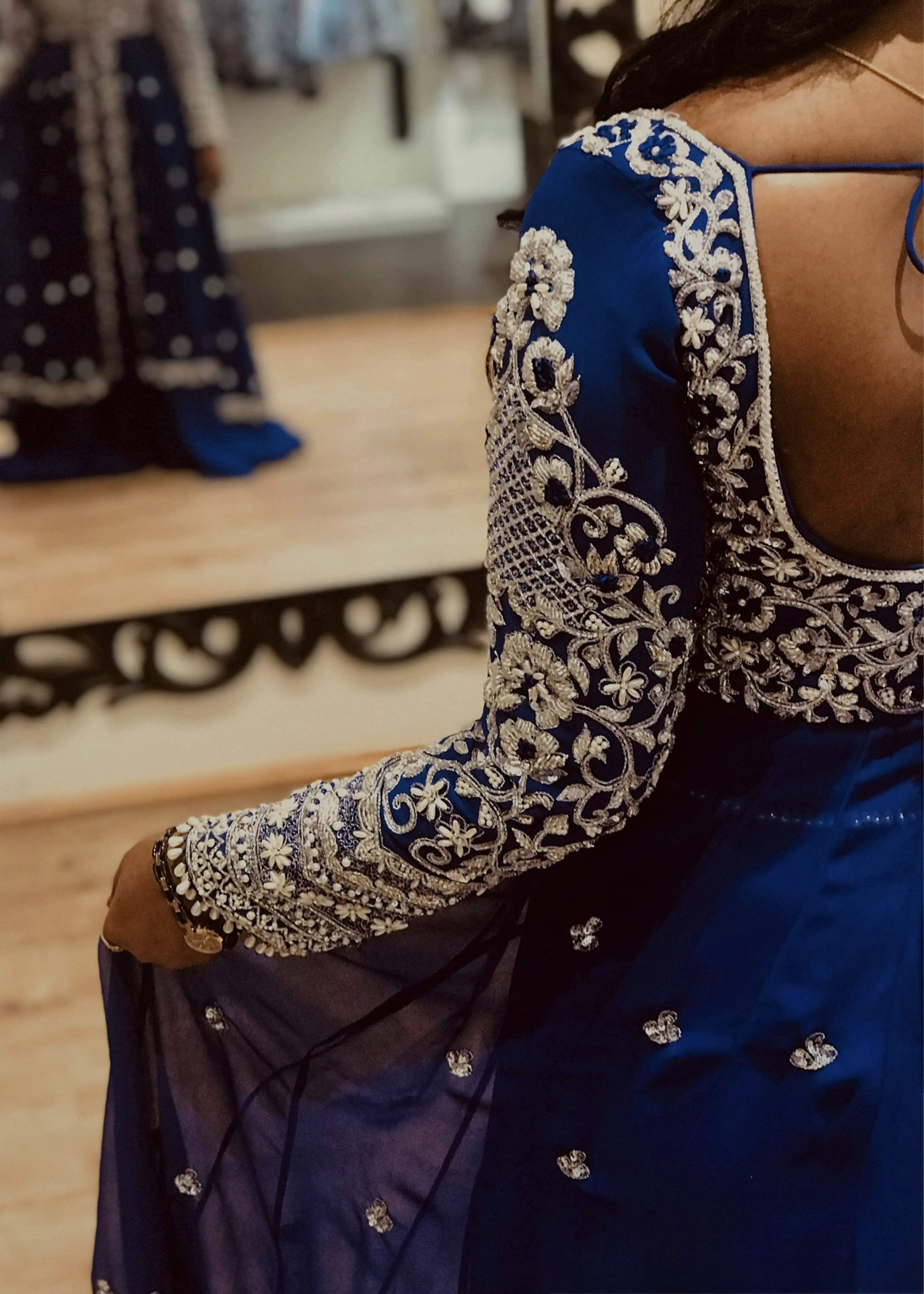 Bride from Chennai for her fittings session in navy blue masakali lehenga with silver embellishments designed by Archana Karthick
