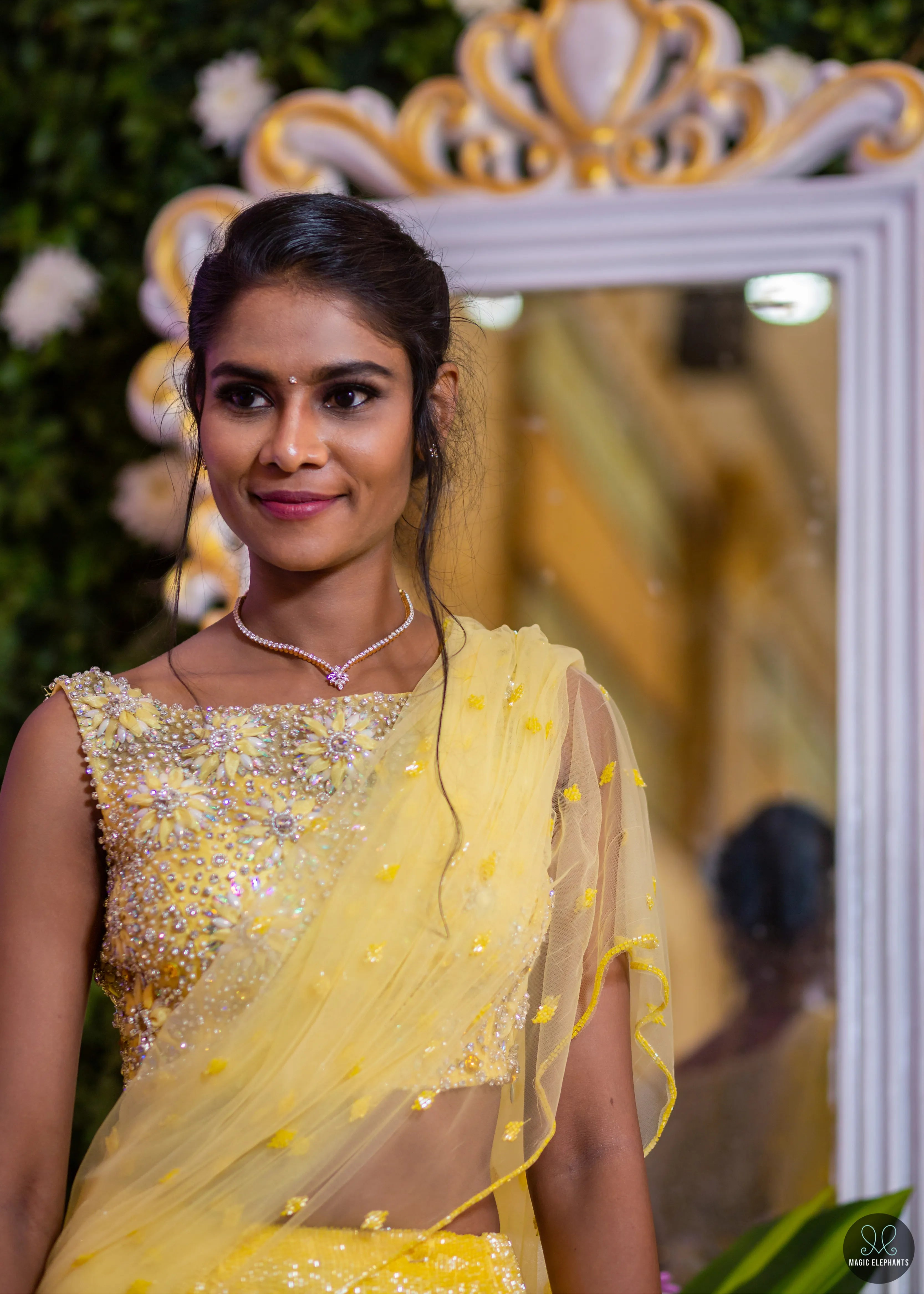 Bride from Chennai for photos in handcrafted yellow mermaid lehenga embellished with cut dana, pearls, rhinestones and handmade 3D flowers.