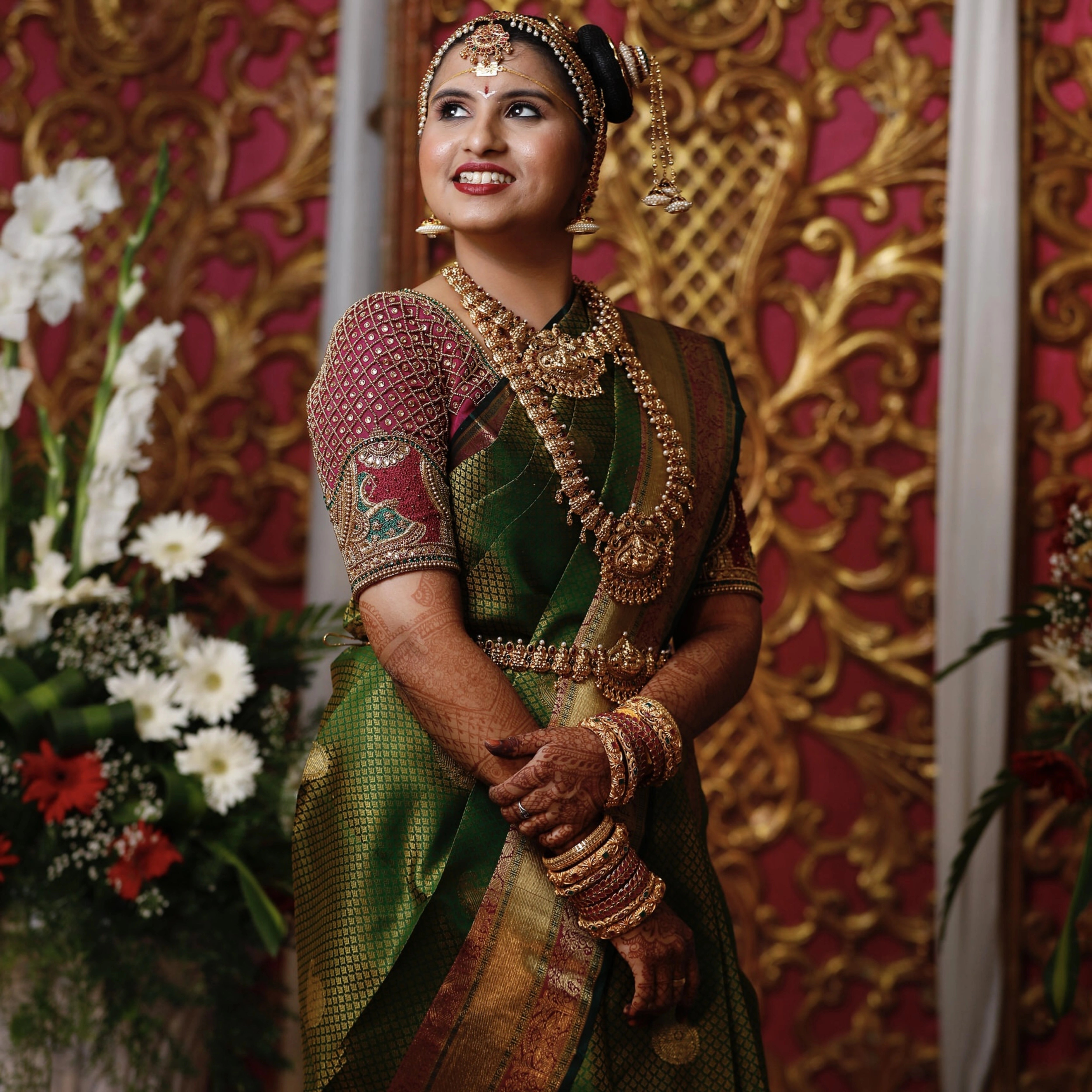 Bride from Chennai in a silk blouse designed by Archana Karthick handcrafted intricately with zardozi, beads, resham and kundan.