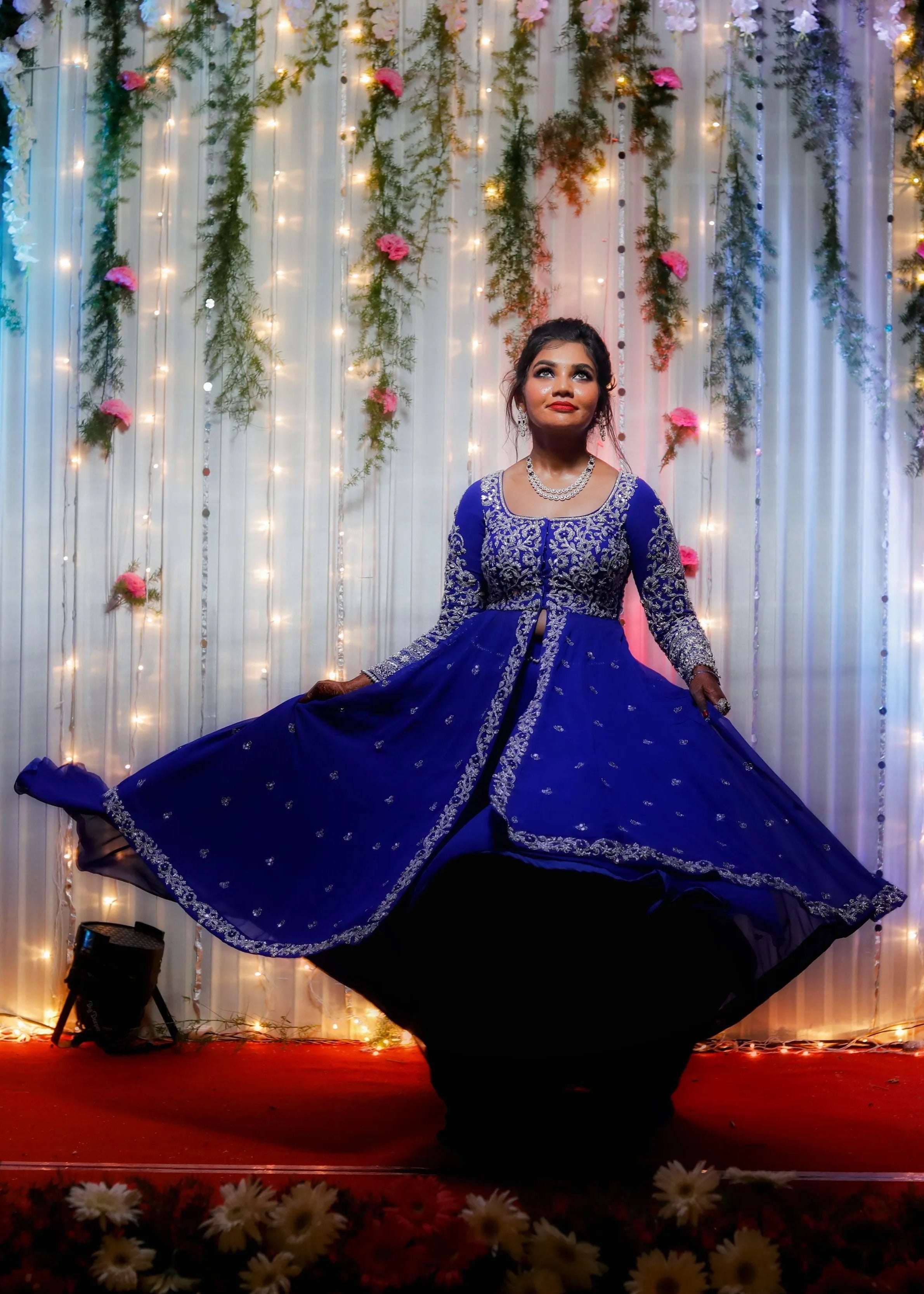 Bride from Chennai in navy blue masakali lehenga with silver embellishments designed by Archana Karthick