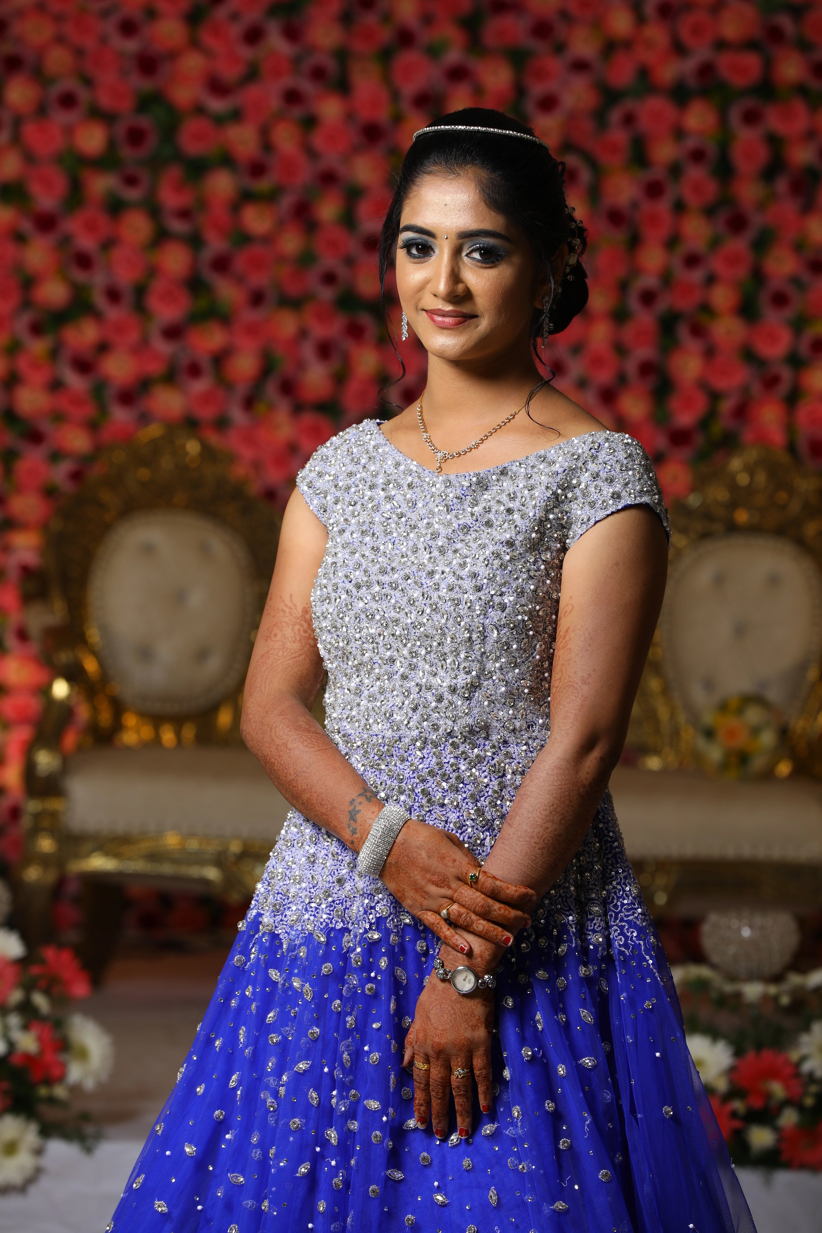 Bride from Coimbatore in a concept gown in tulle designed by Archana Karthick handcrafted intricately with stones, cutdana and sequins.
