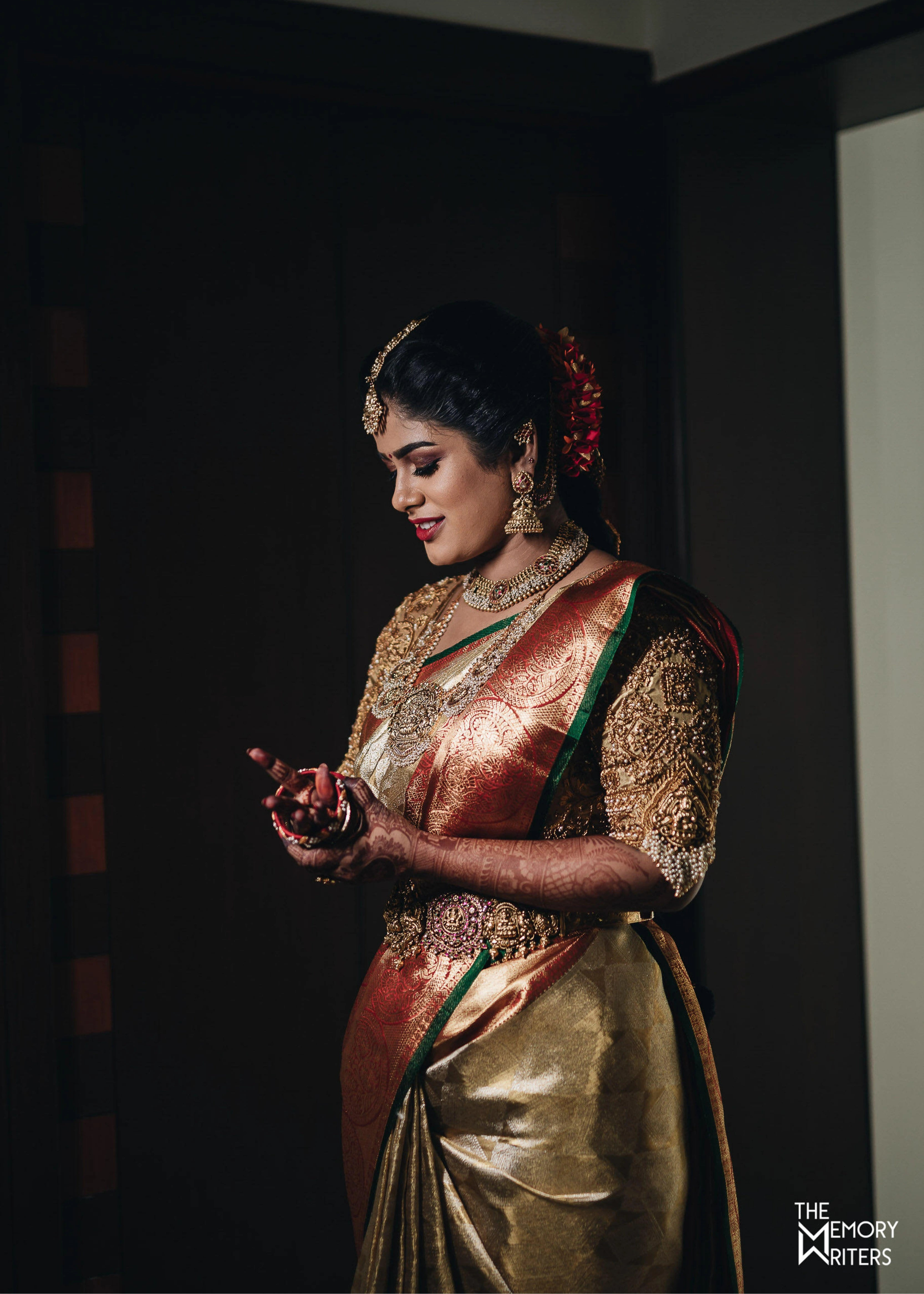 Bride from Erode in a handcrafted gold silk blouse designed by Archana Karthick