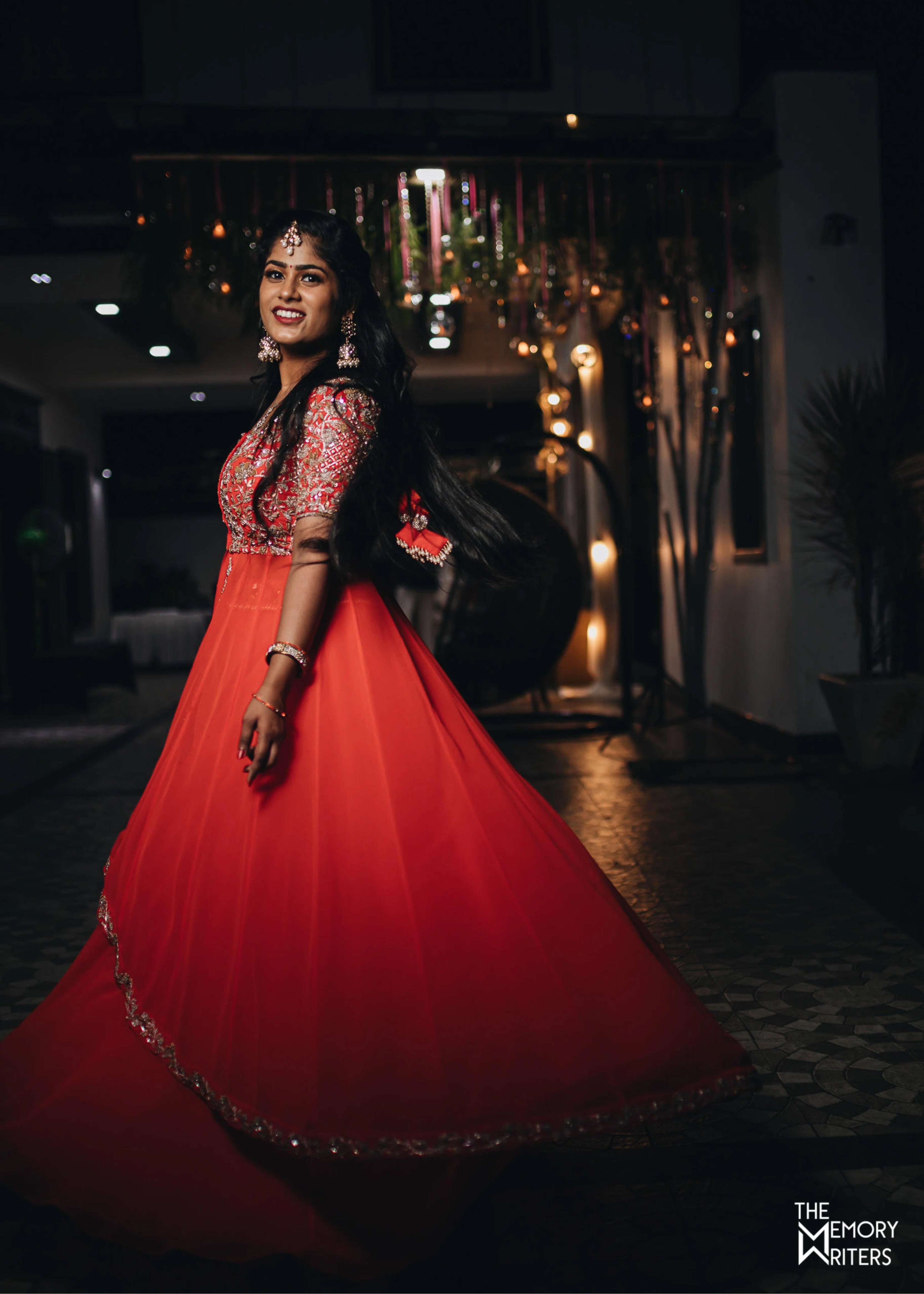 Bride from Erode in a handcrafted orange masakali lehenga with cut dana, sequins and beads in tulle.