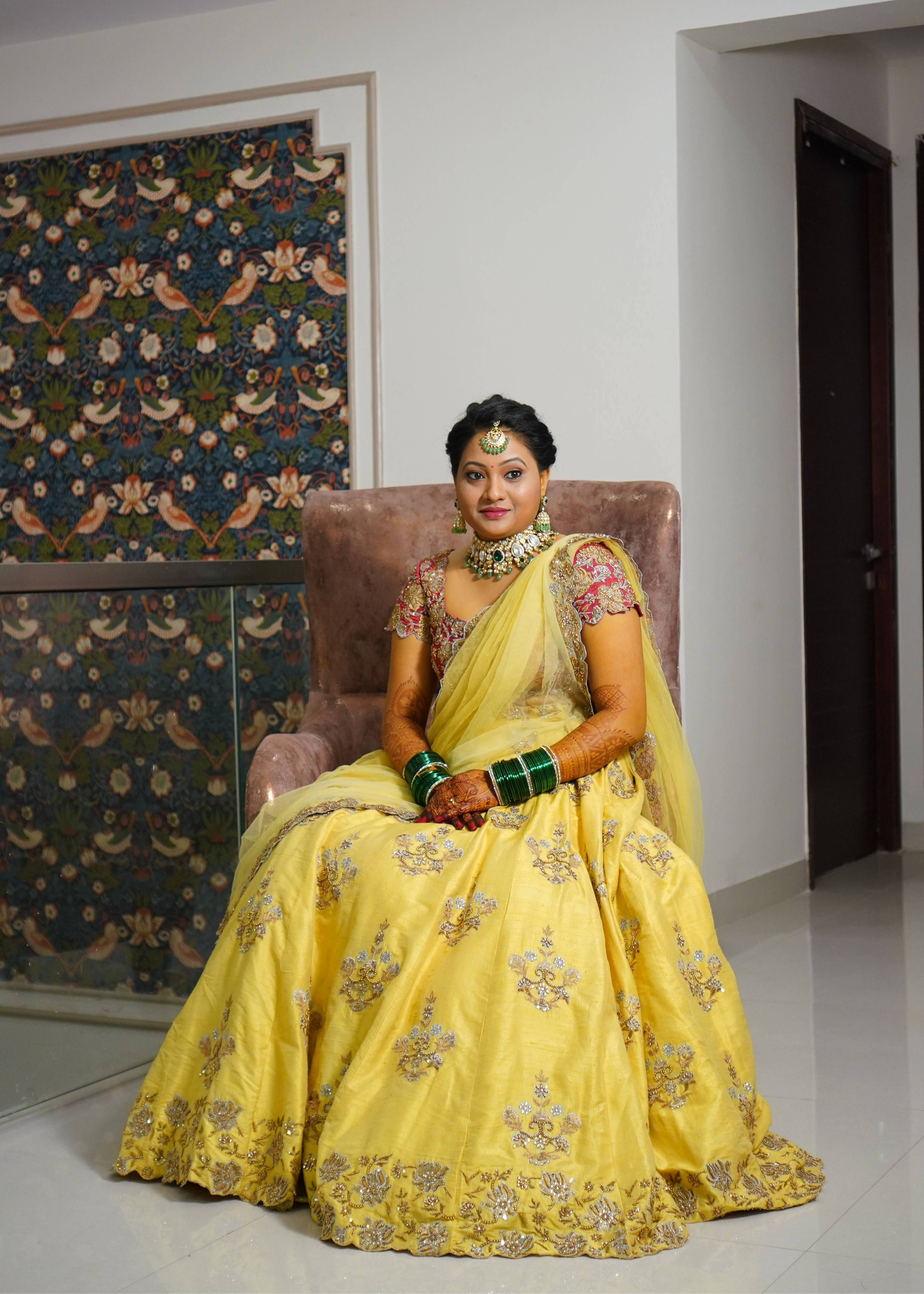 Bride from Seattle in a yellow and red raw silk and yellow tulle dupatta handcrafted with zari, beads, cutdanas and sequins. Designed by Archana Karthick.