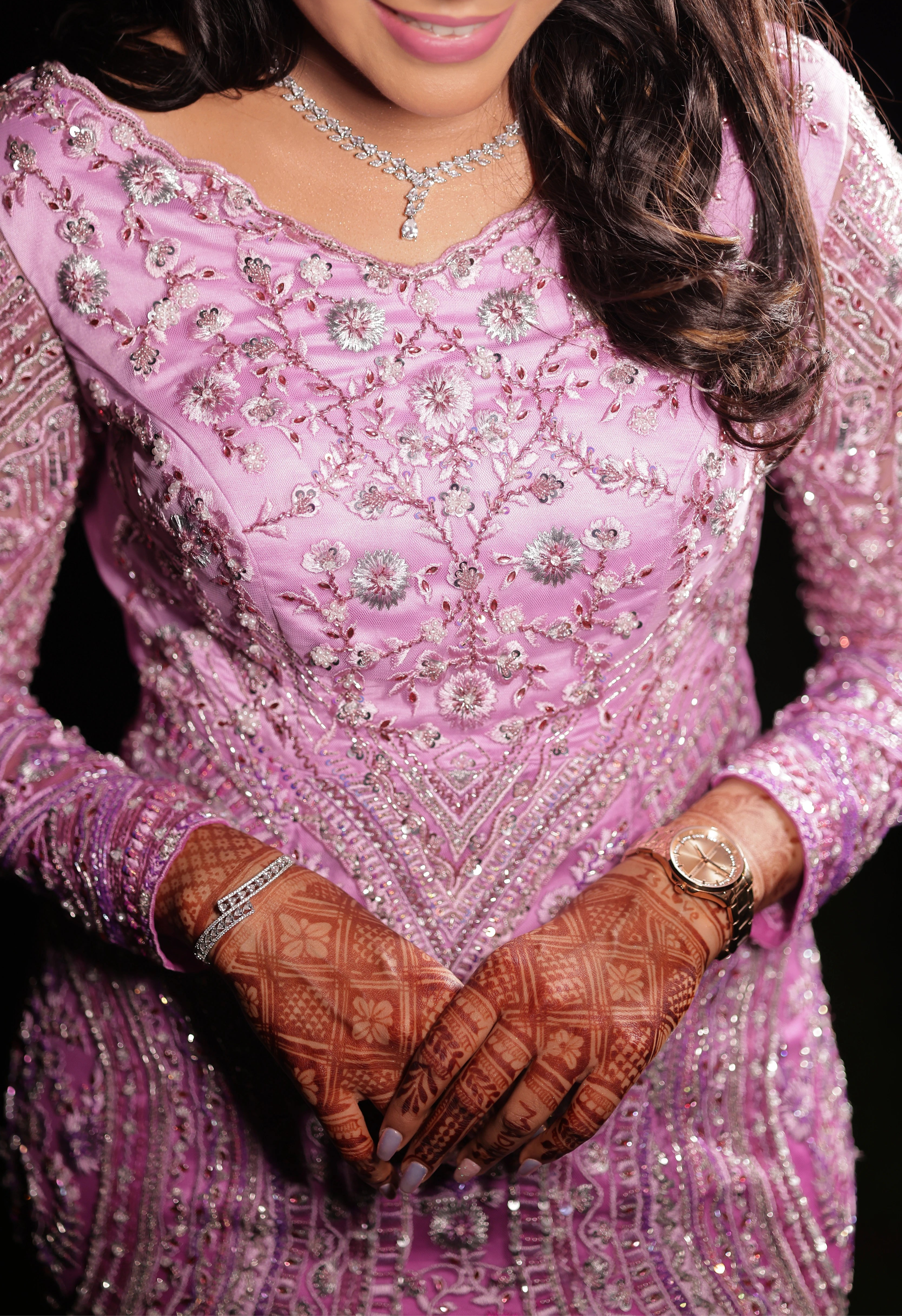 Bride from UK closeup shot in ombre pink mermaid gown designed by Archana Karthick