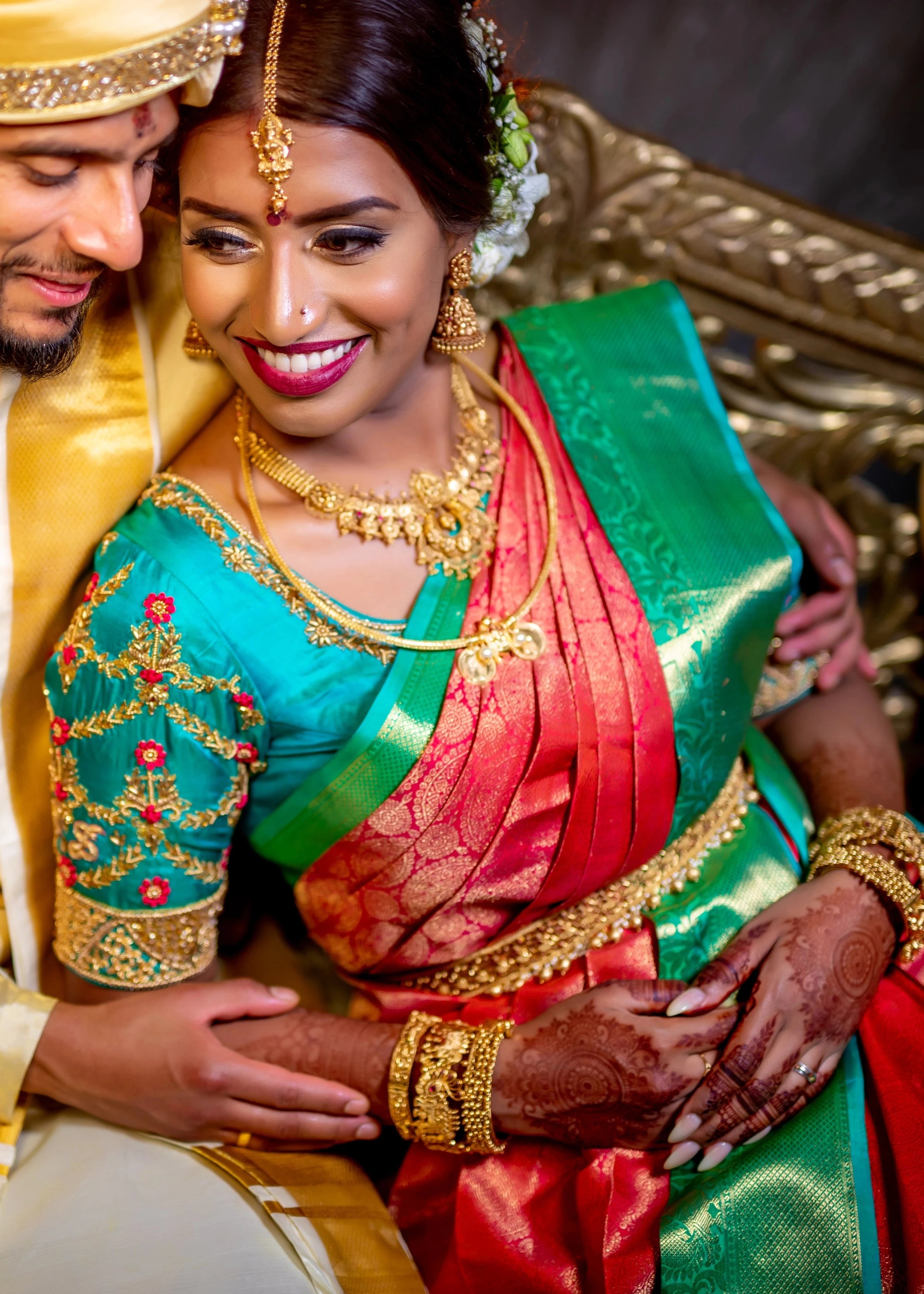 Bride from UK in an aquamarine silk blouse for her wedding. Handcrafted intricately with beads, zardozi and resham knot work by team Archana Karthick.