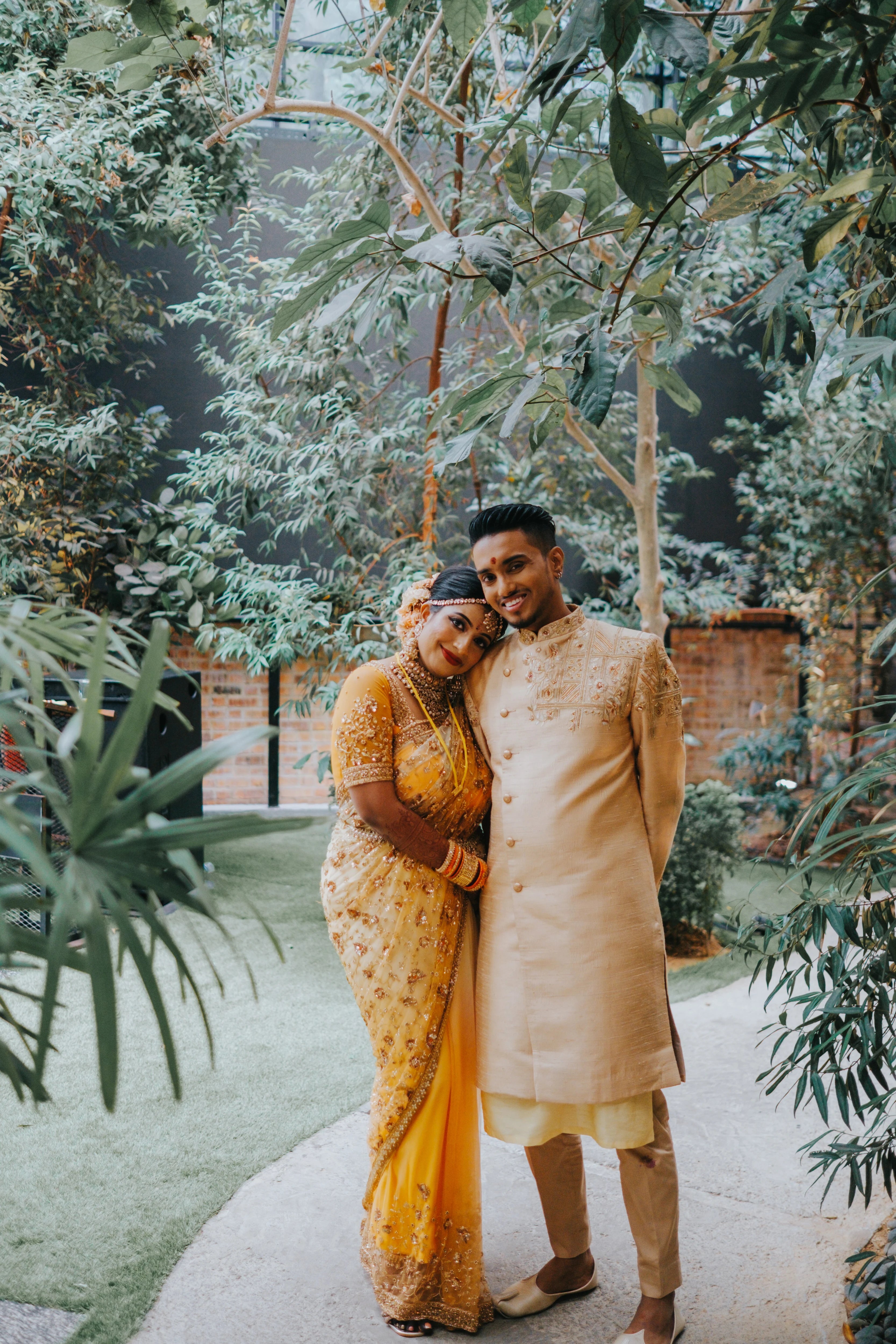 Couple from Malaysia, in a sherwani handcrafted by team Archana Karthick.