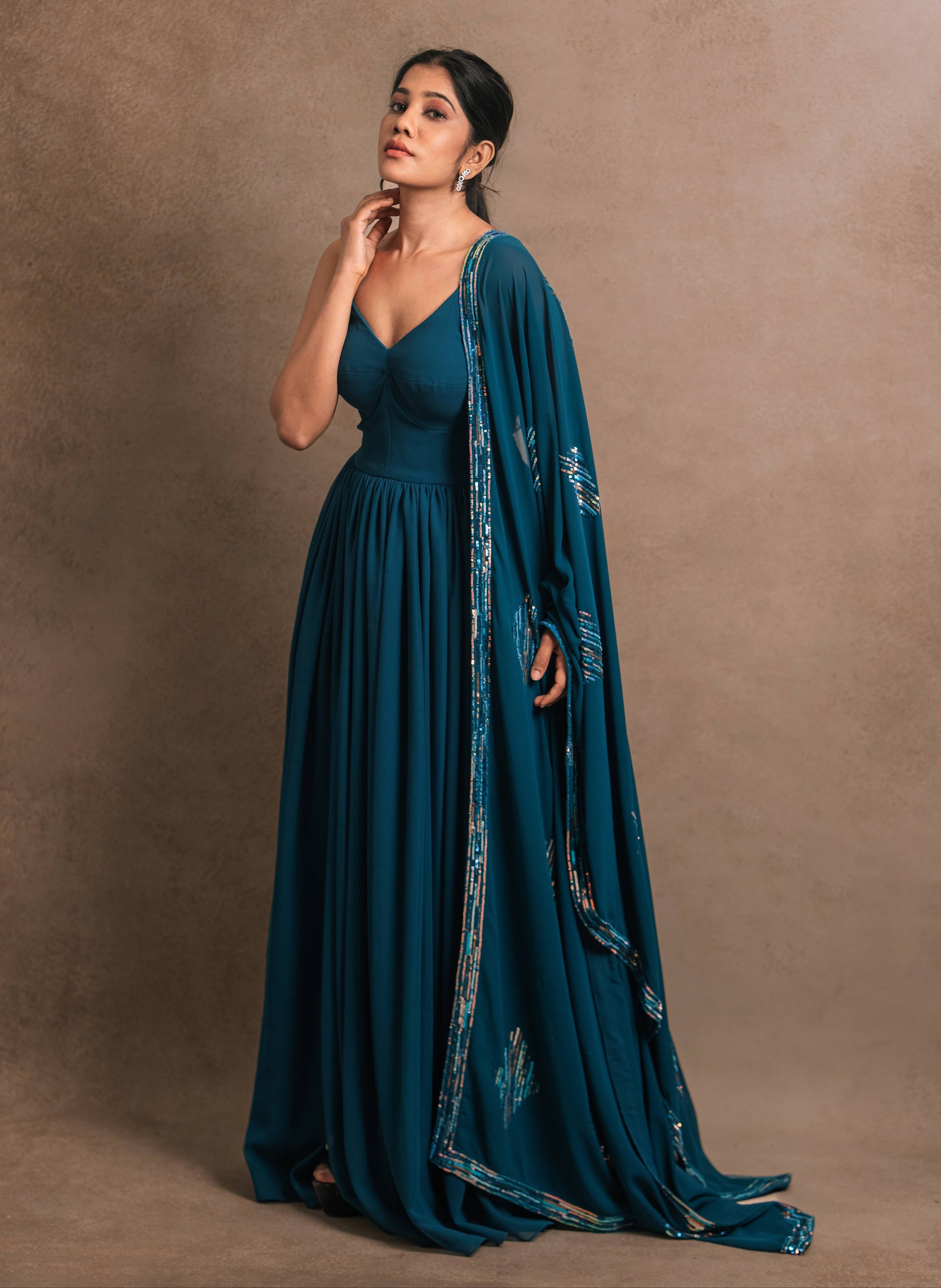 Egyptian blue georgette anarkali-kurti, featuring a sleek slit, paired with an intricately handcrafted georgette dupatta by team Archana Karthick.