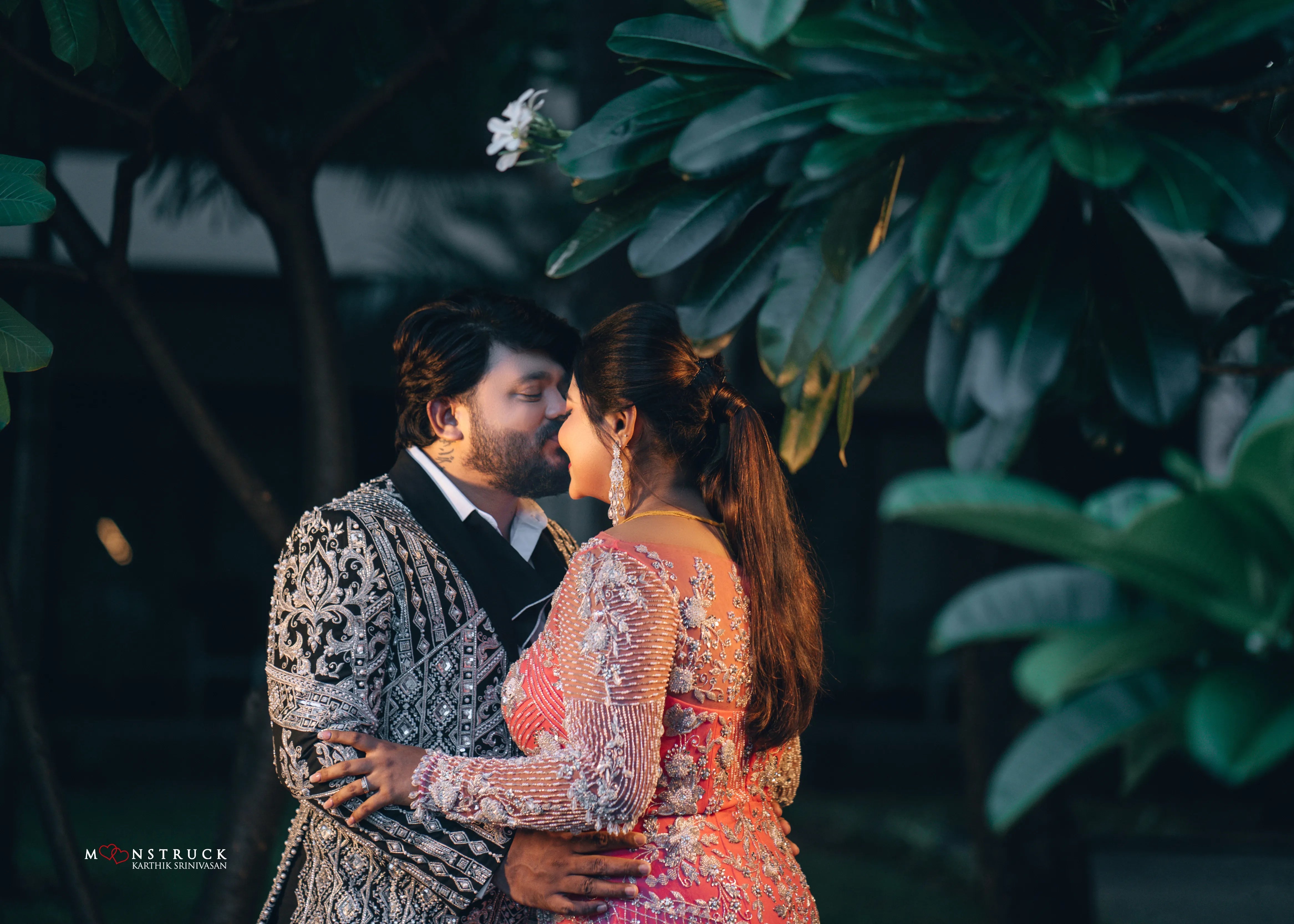 Groom (Chennai) in a bespoke suit by Archana Karthick with Bride (Coimbatore) in a handcrafted pink tulle gown. Jacket and gown embellished with zardozi, cut dana, beads, stone work and sequins.