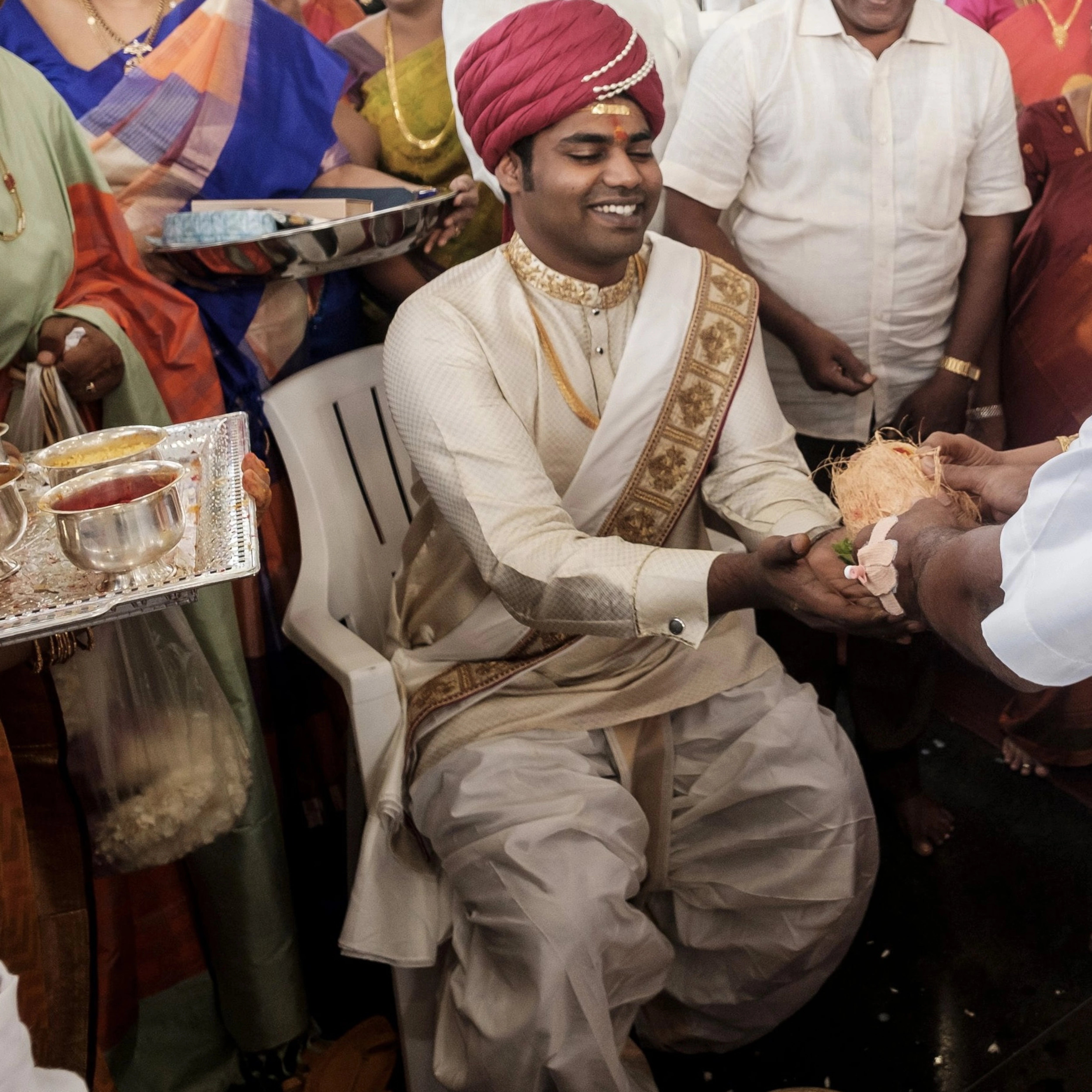 Groom Gowtham in a silk panchakacham suit, shawl and turban for his wedding, intricately handcrafted with zardosi, resham, zari and sequins by team Archana Karthick.