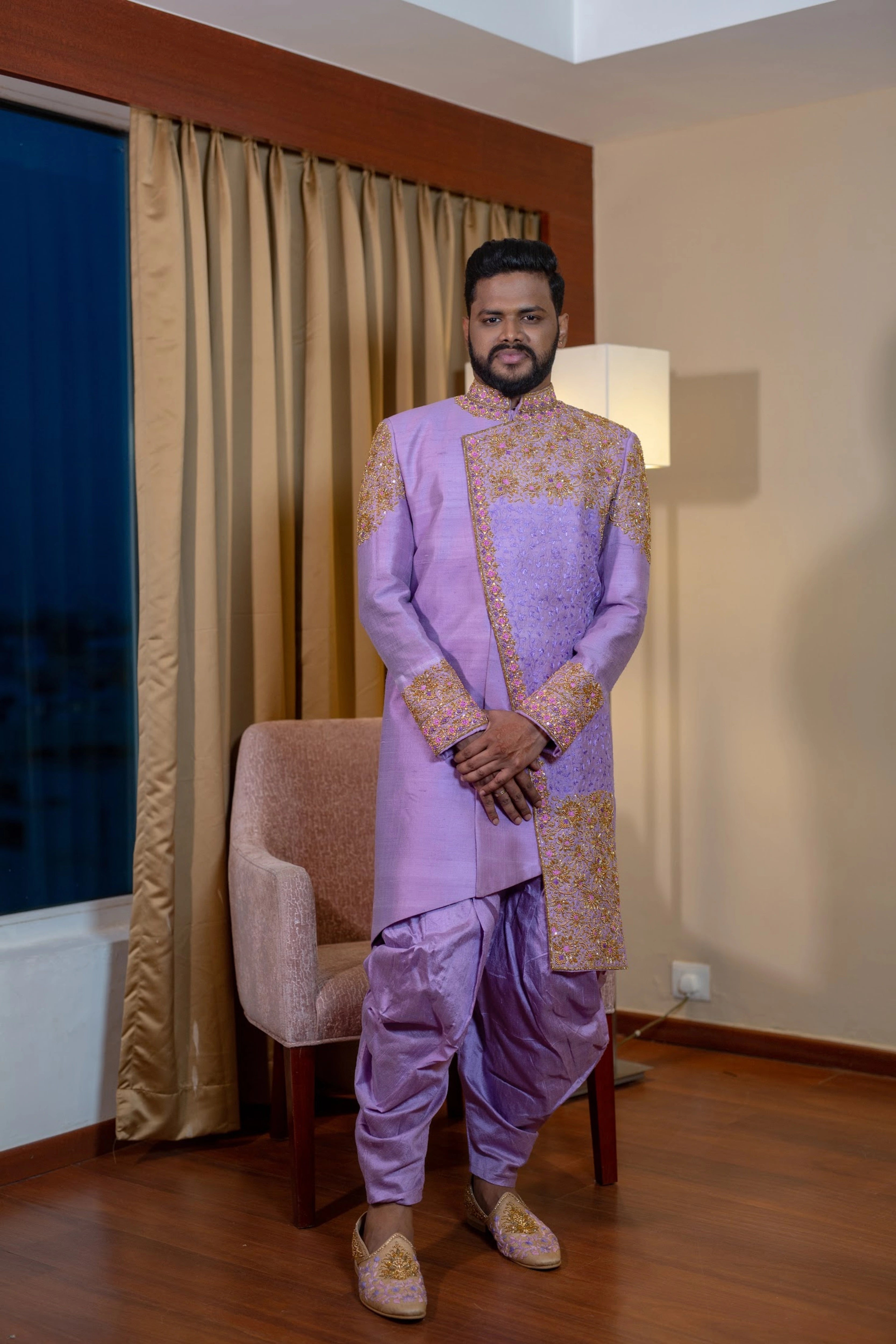 Groom Nirmal Kumar in an indowestern sherwani intricately handcrafted with resham, beads and sequins by team Archana Karthick.