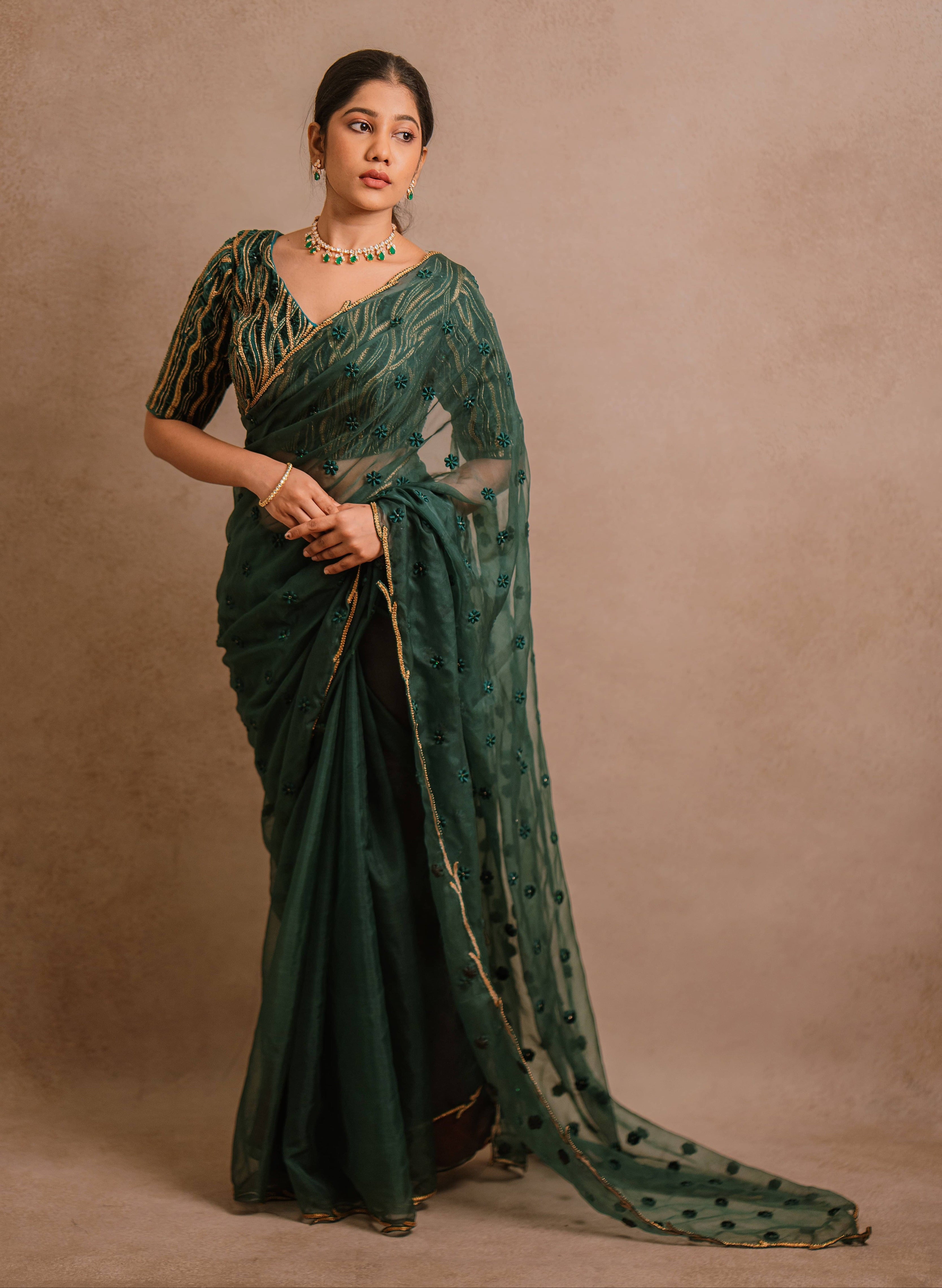 Jaina Parmar, known for recreating looks of actress Nayanthara is seen here in green organza saree set designed by Archana Karthick