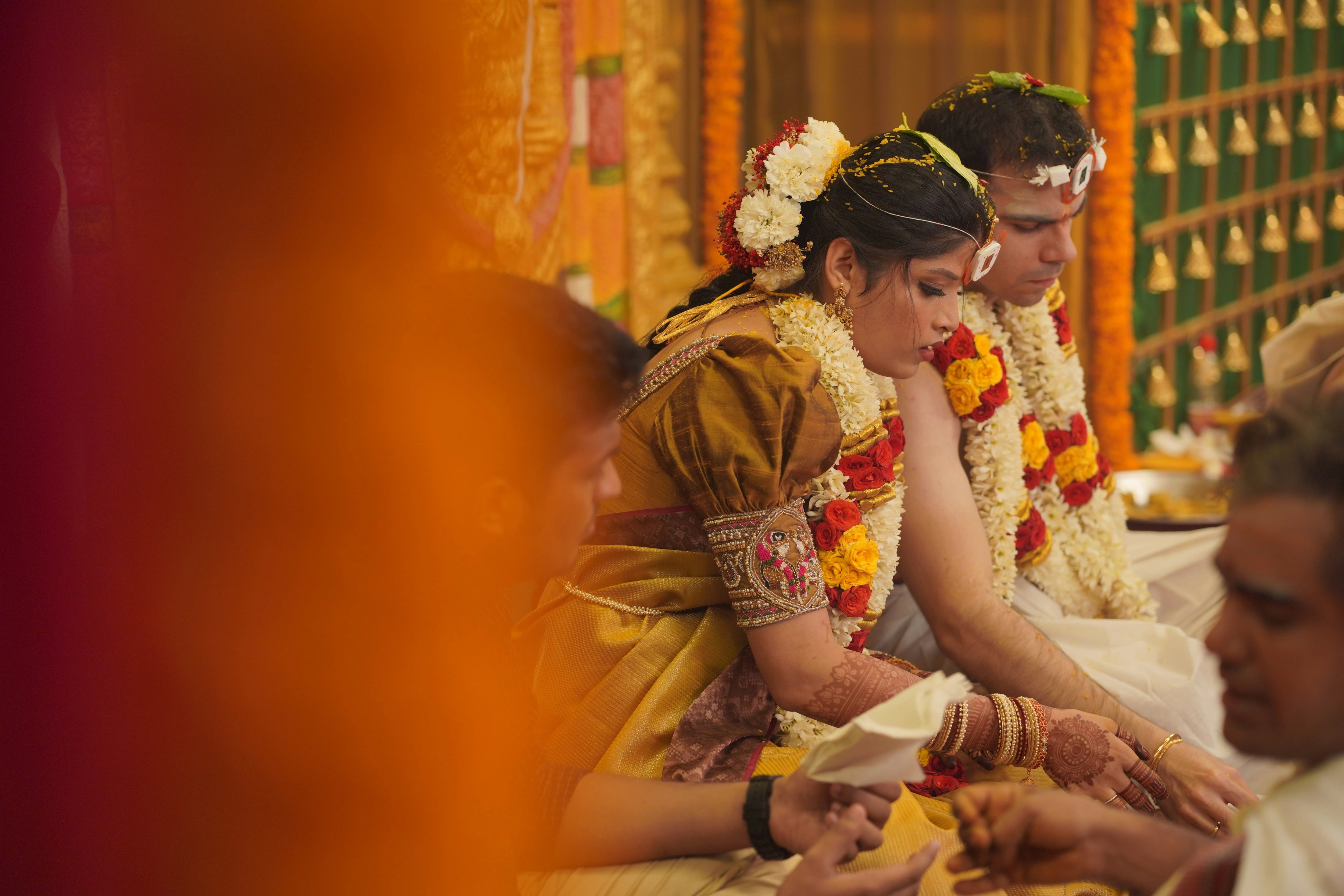 Kamakshi from Yokosuka, Japan in a mustard silk blouse handcrafted by team Archana Karthick.