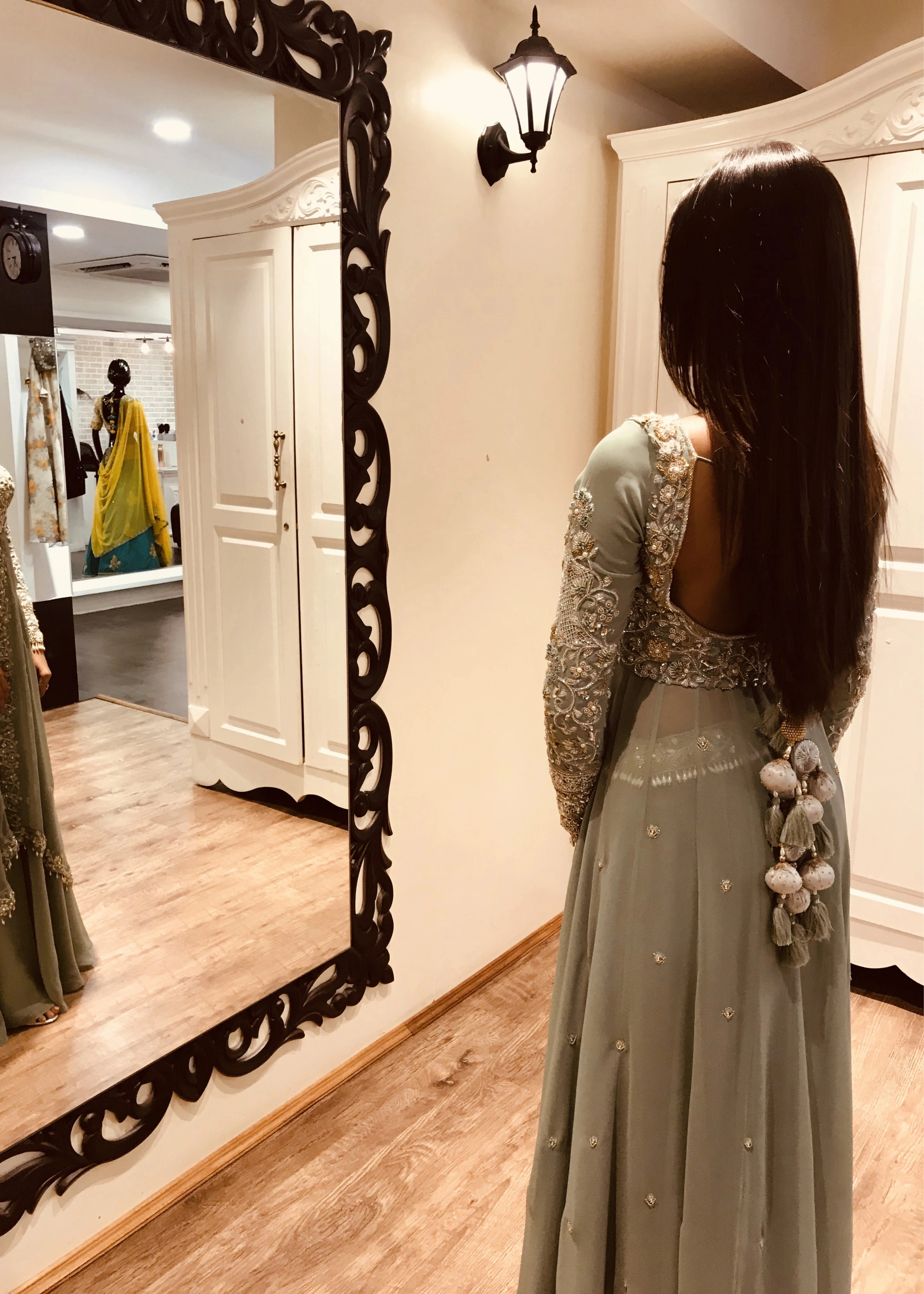 Miss India and actress Anukreethy Vas showcasing back design in a muted blue aquamarine georgette masakali lehenga. Intricately handcrafted with crystals, etc by team Archana Karthick.