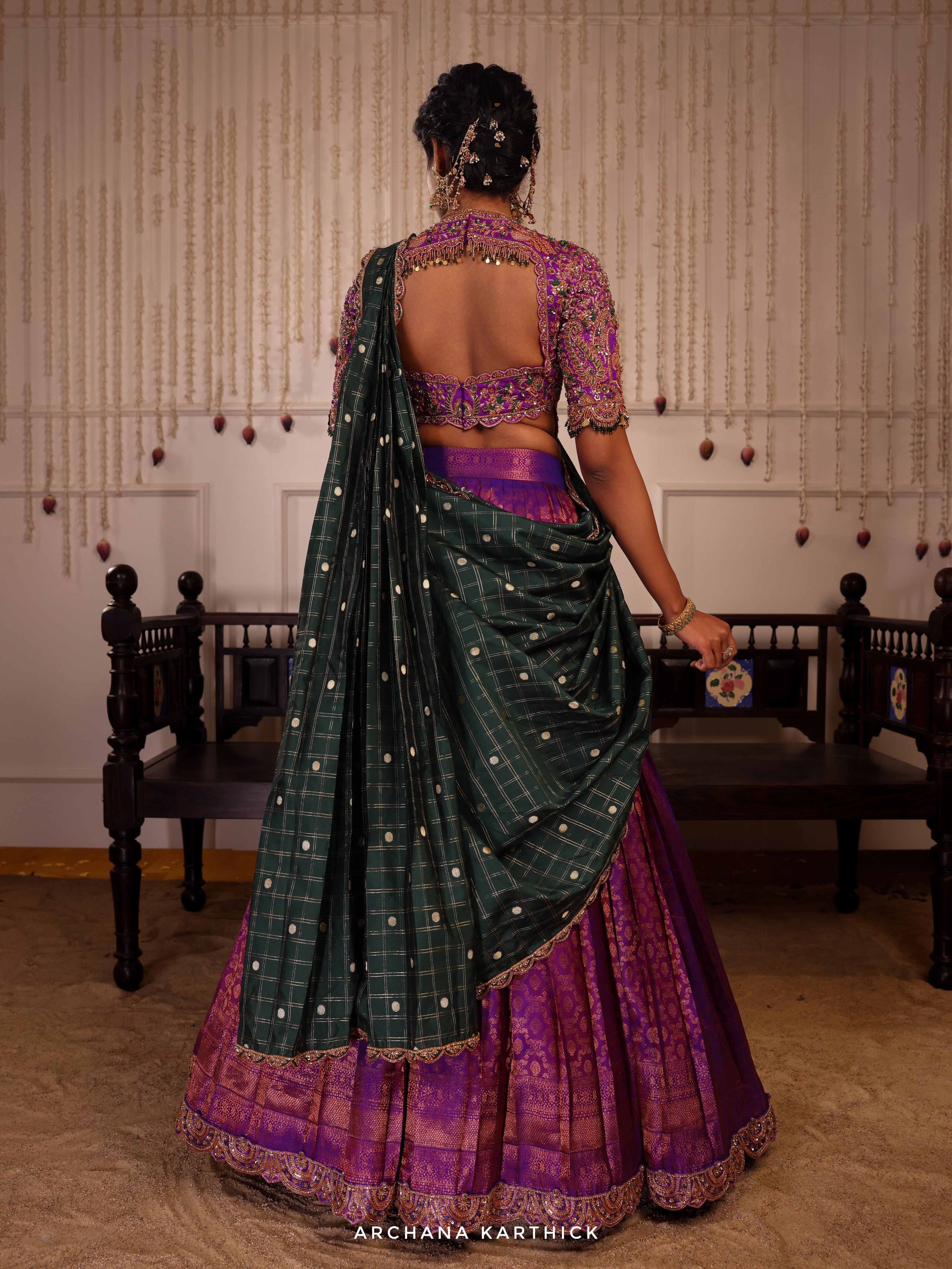Model Gayathri Dhanasekar in purple and green kanjeevaram silk half saree with vummidi bangaru jewellery