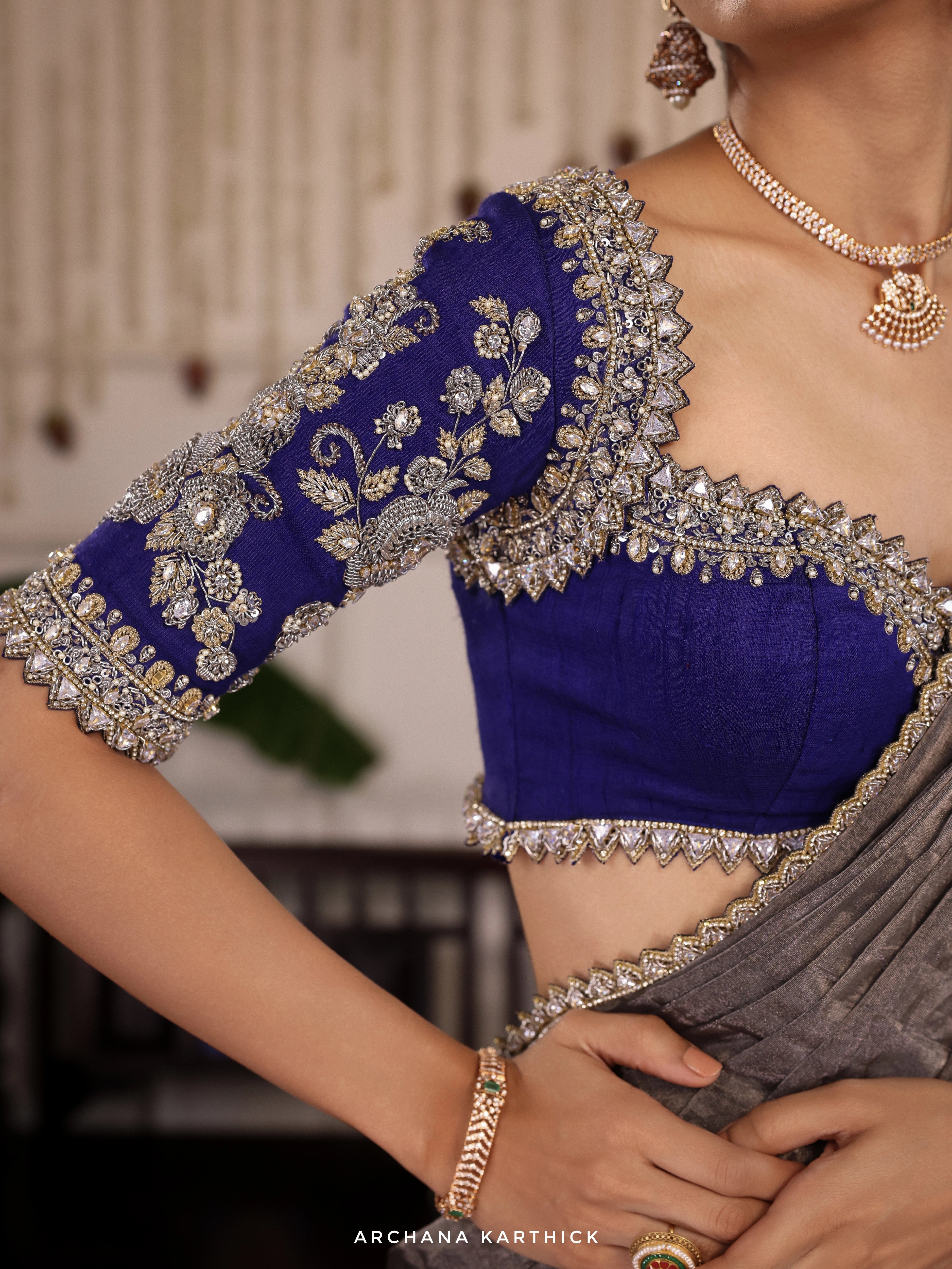 Model Himanshi in a silver and blue kota silk half saree with vummidi bangaru jewellery