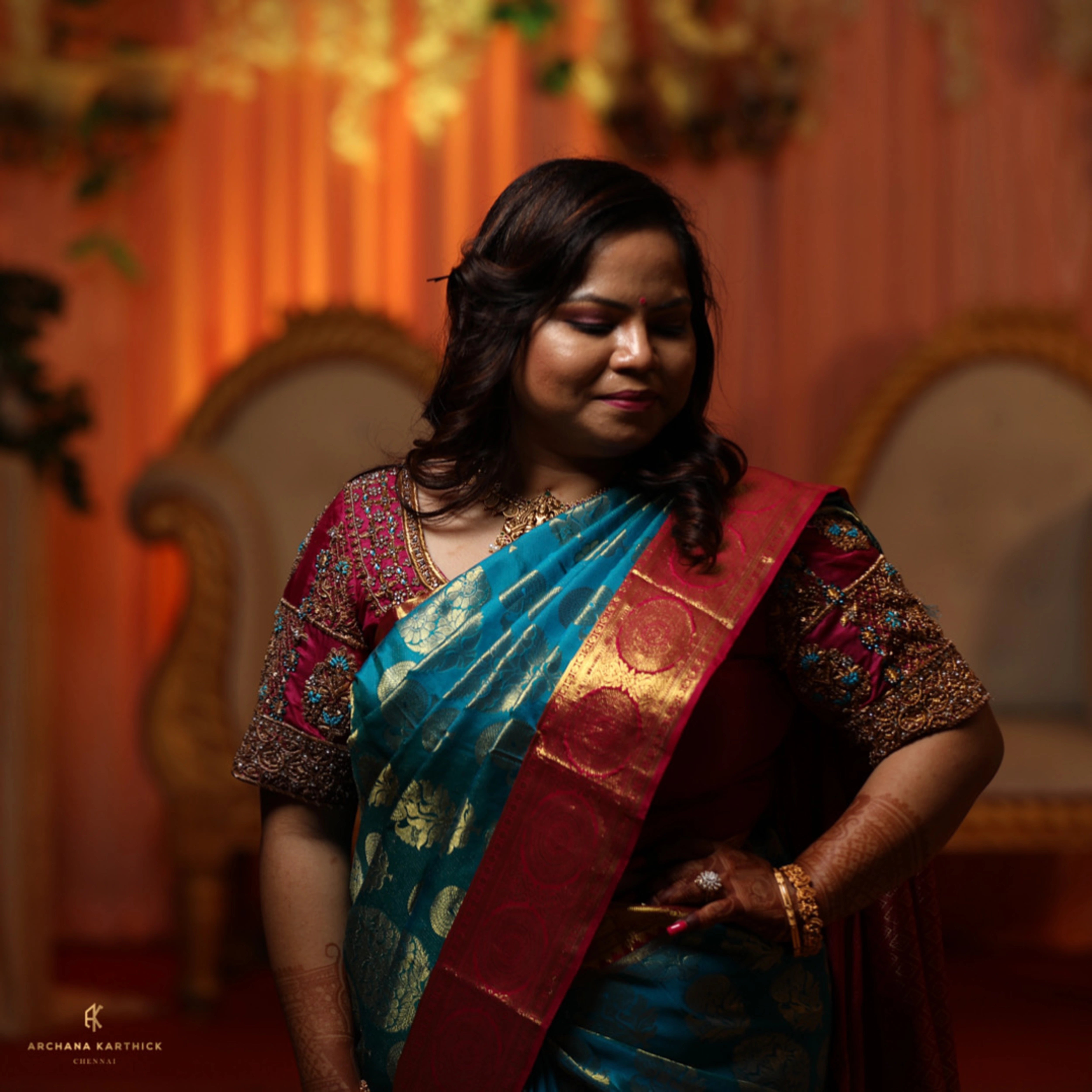 Model Adyasha in a magenta silk blouse designed by Archana Karthick