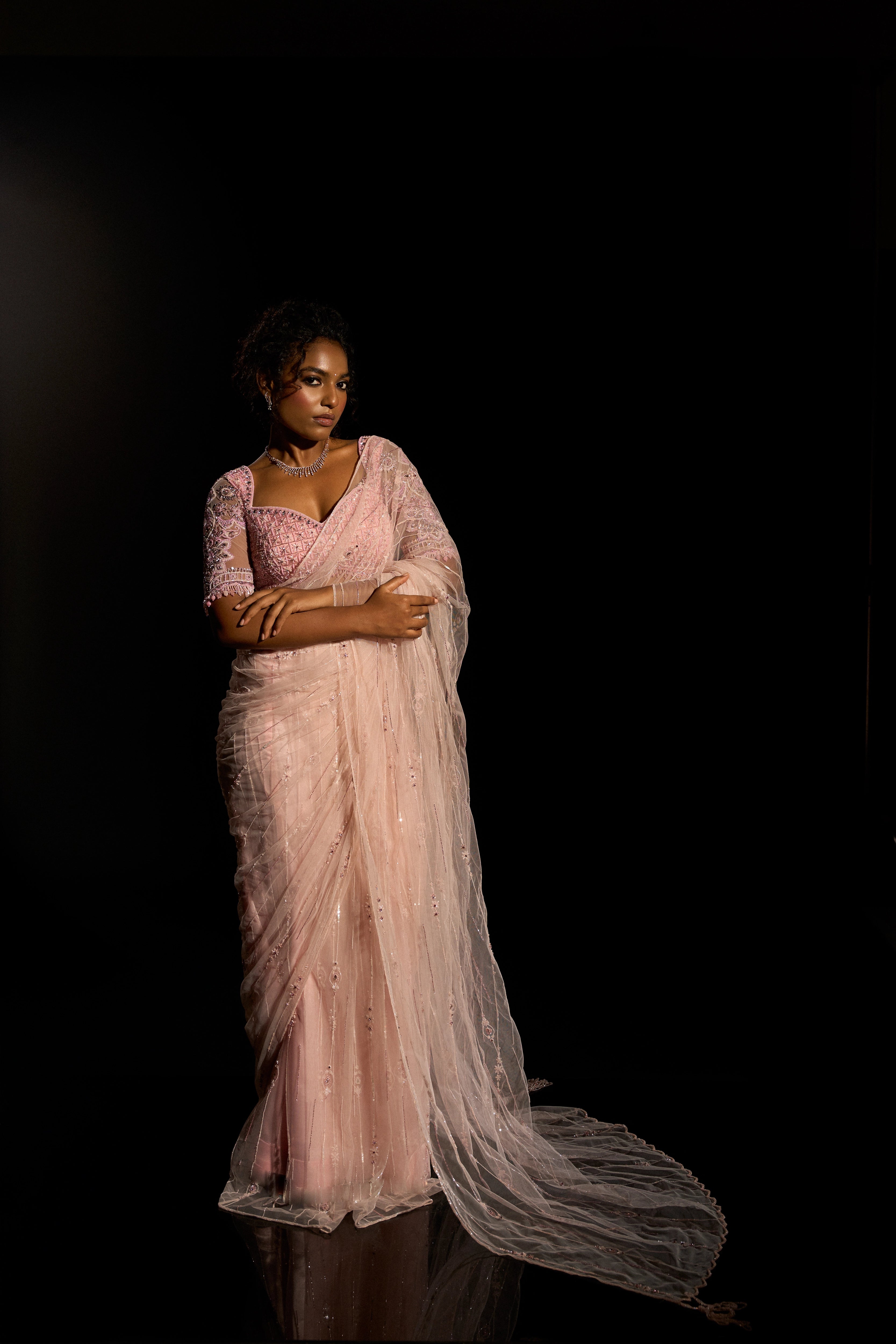 Model Ashika Crystal during photoshoot in a blush pink saree set, intricately adorned with sequins, rhinestones, crystals and cutdana for "STARDUST" - A/W'25 saree collection by team Archana Karthick.