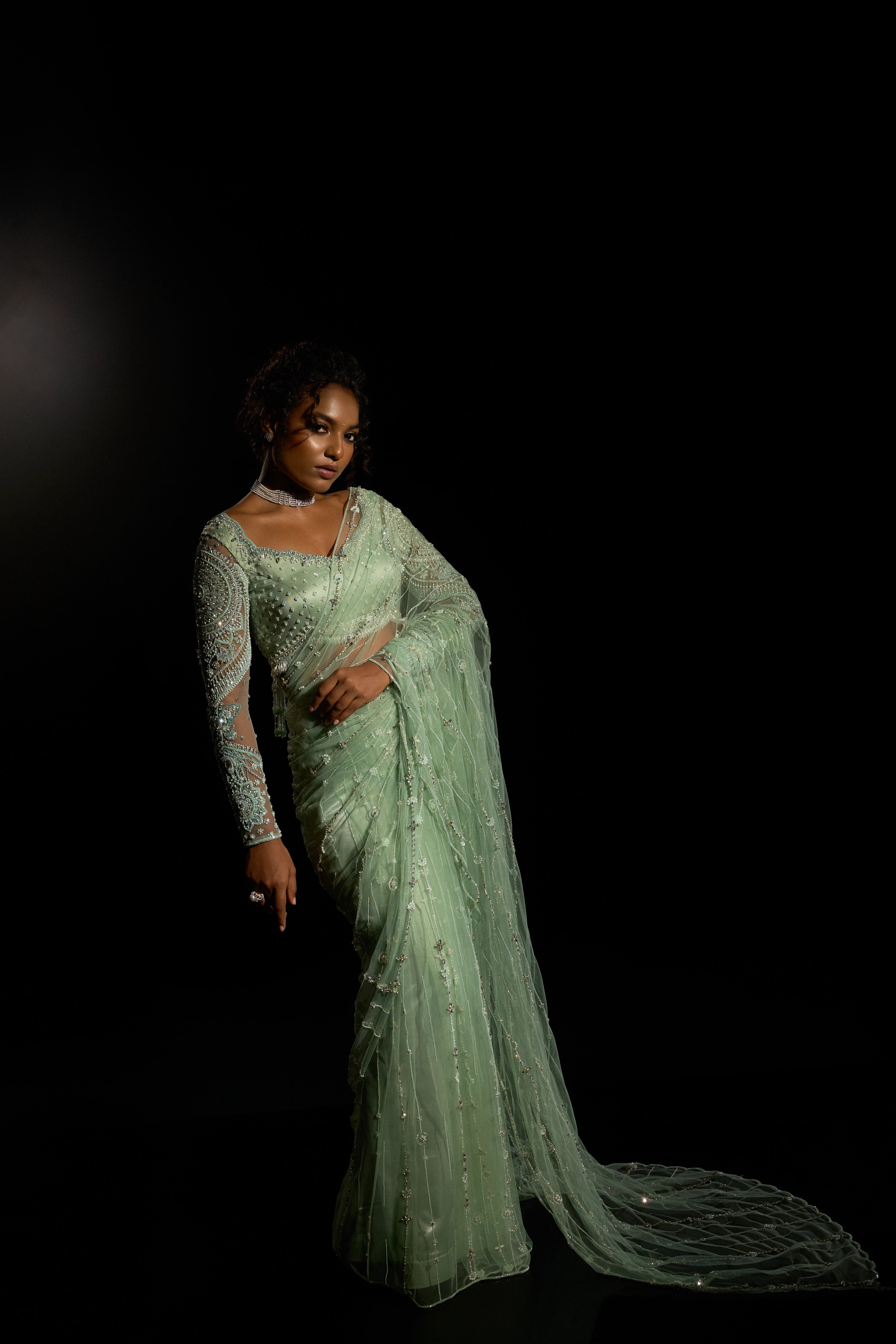 Model Ashika Crystal in a green saree set intricately adorned with sequins, rhinestones, crystals and cutdana for "STARDUST" - A/W'25 saree collection by team Archana Karthick.