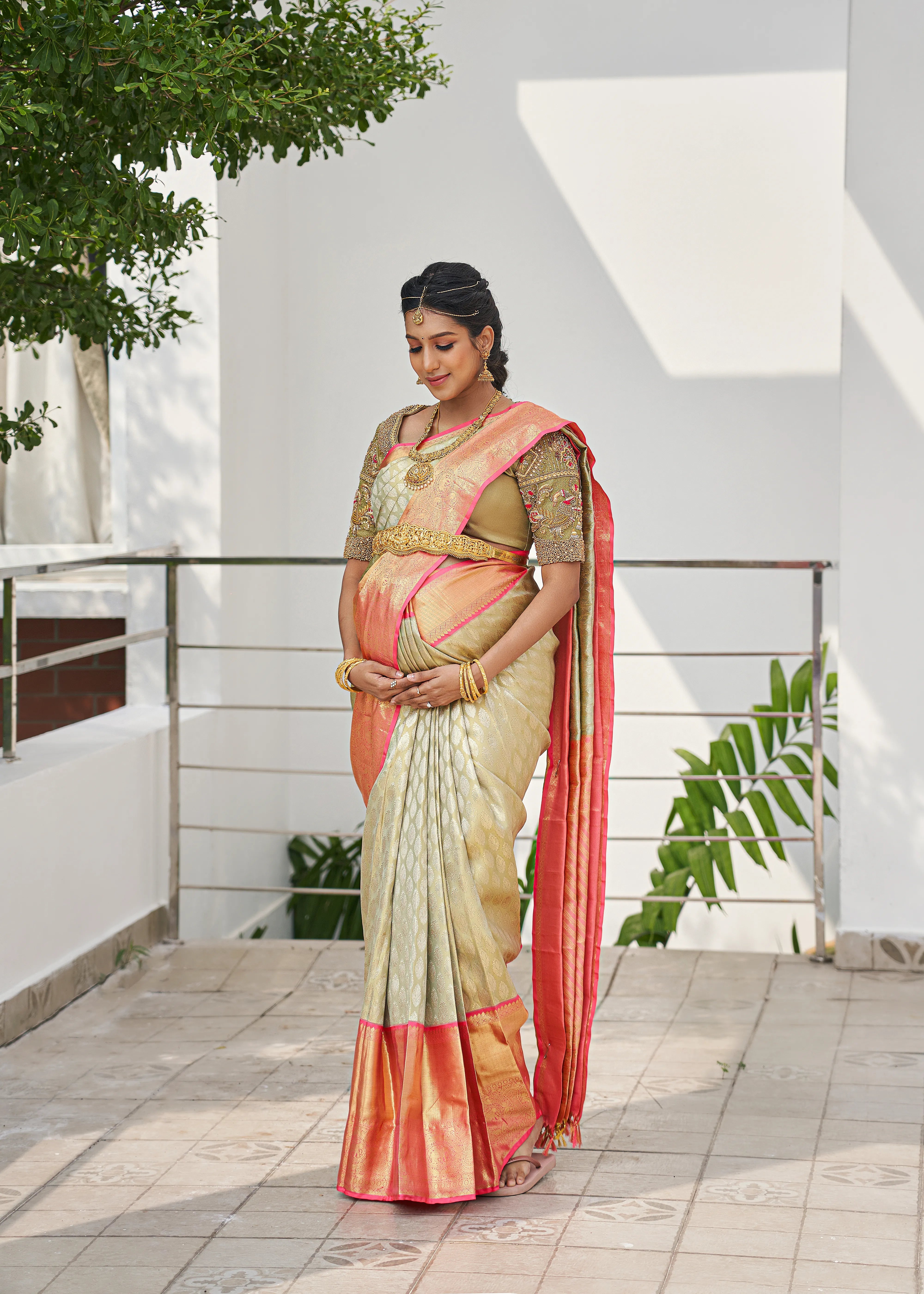 Model Ashwini Kumar, one of the mommies to be for whom Archana Karthick designed the blouse for her baby shower is looking down