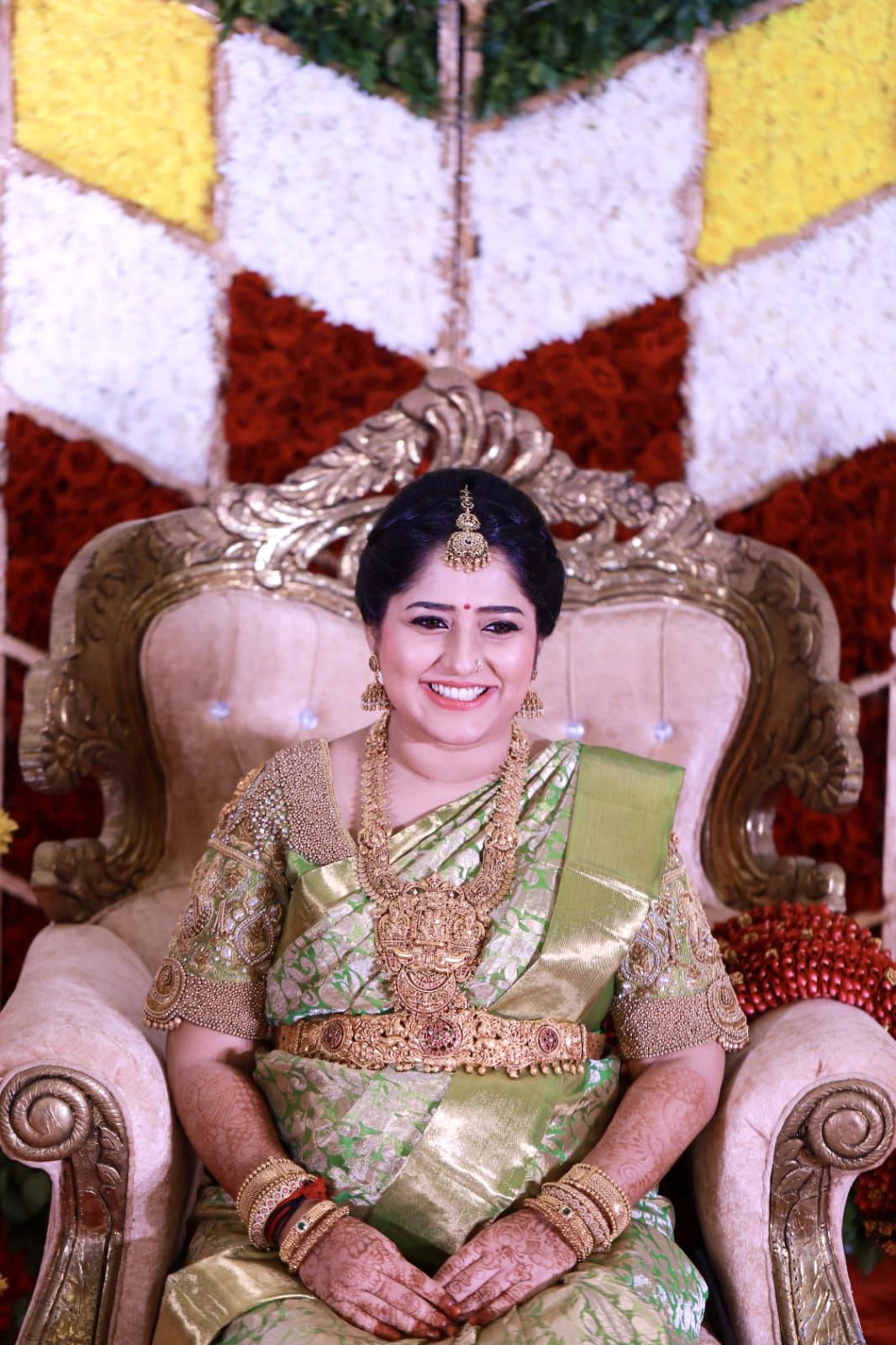 Mother to be, Dr Nivetha from Bangalore in a green silk blouse handcrafted by team Archana Karthick.