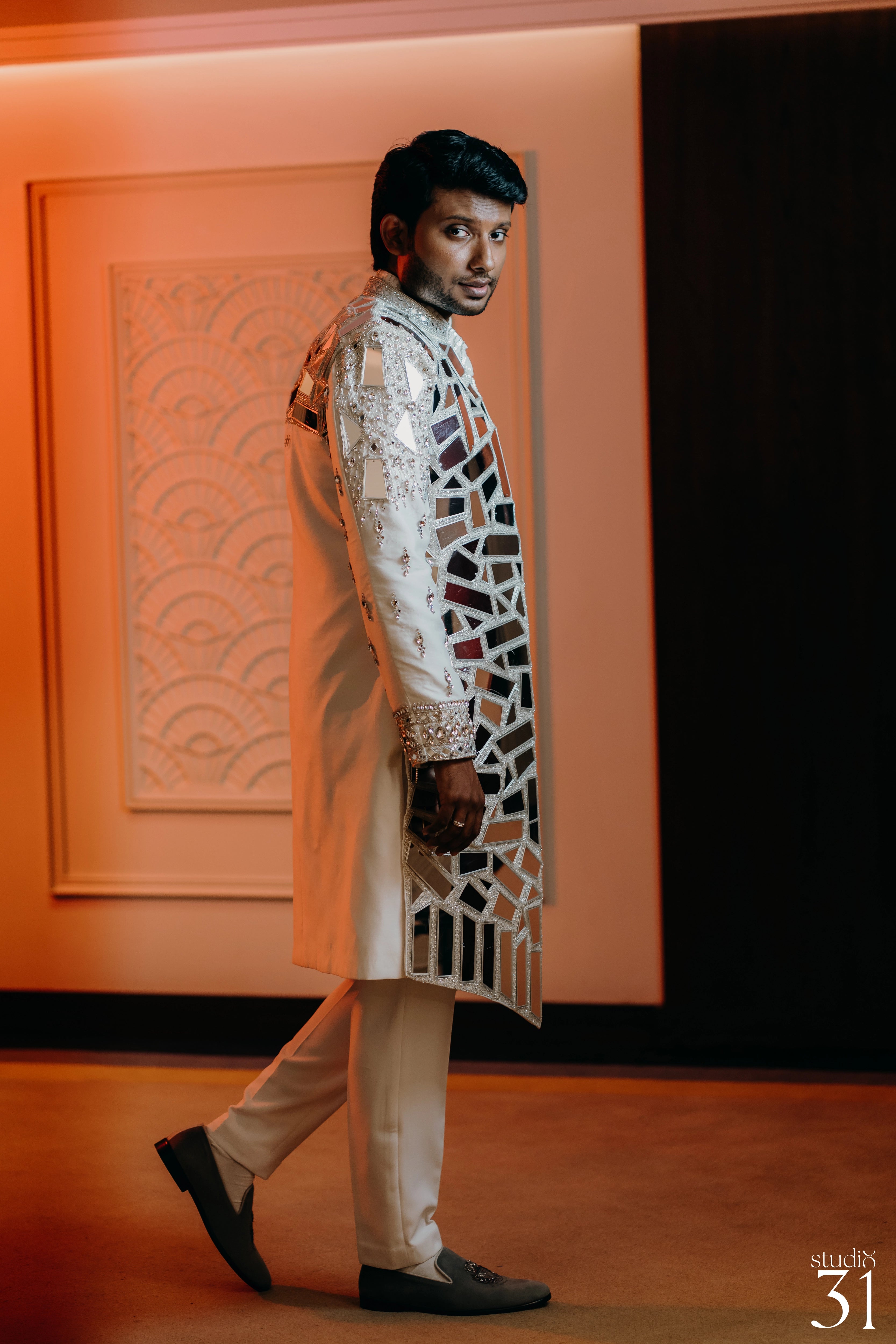 Rhevanth in a fusion sherwani for his sangeet intricately handcrafted by team Archana Karthick.