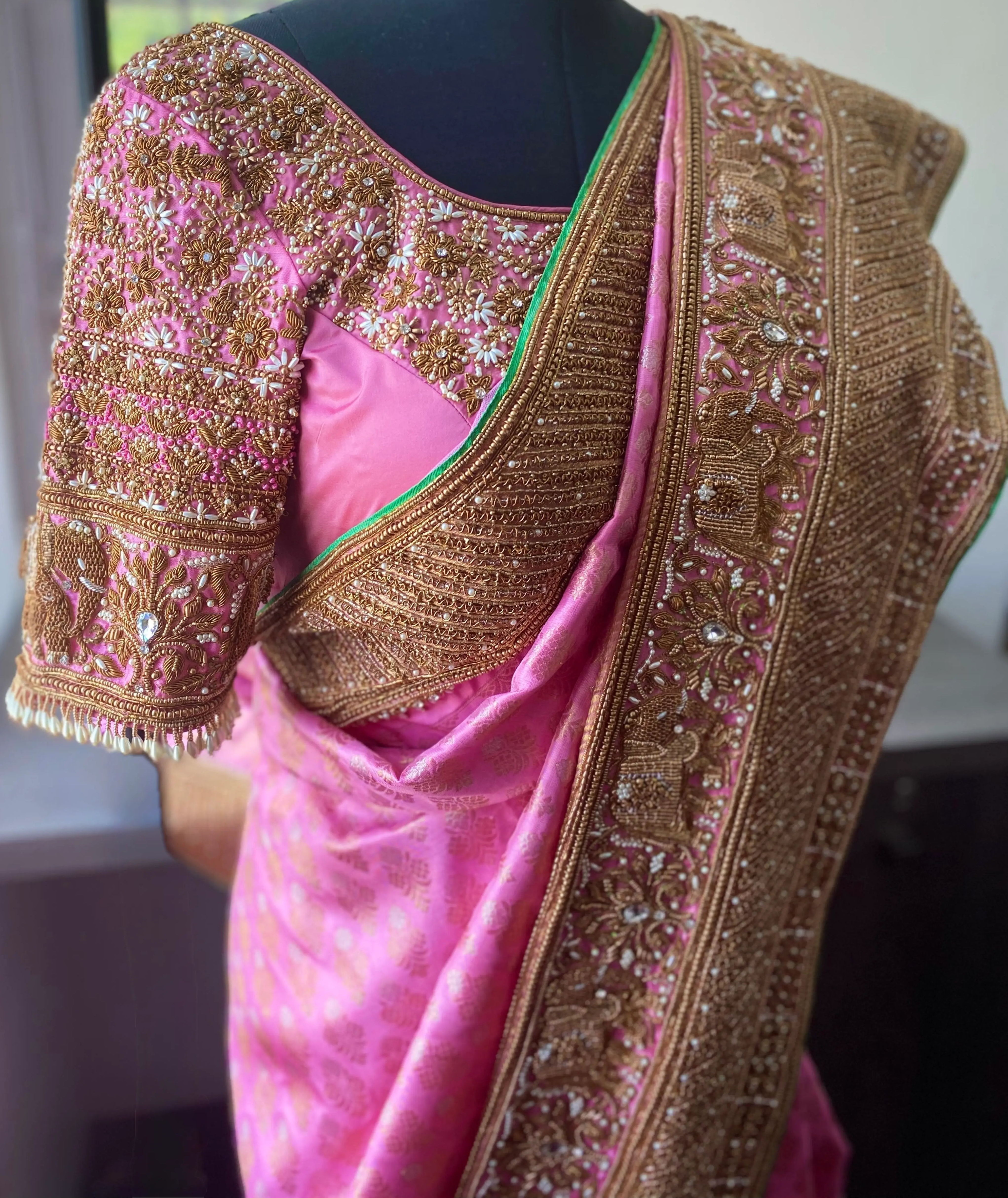 Saree border and blouse designed by Archana Karthick with zardozi and pearls for bride Sathiyapriya from Dindigul. At the atelier front blouse sleeves and saree border detailings