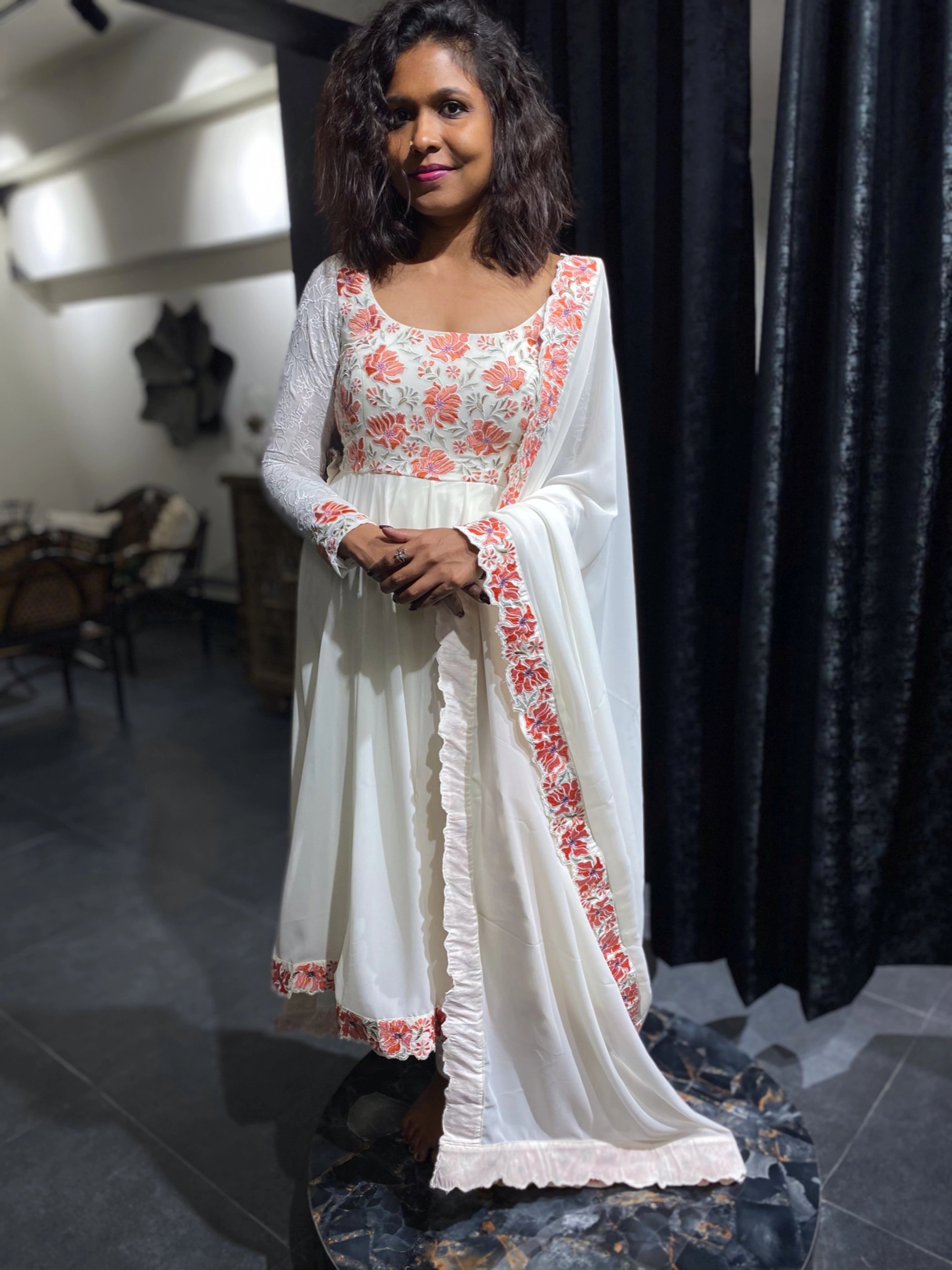Sasi in a white anarkali handcrafted by team Archana Karthick for her birthday.