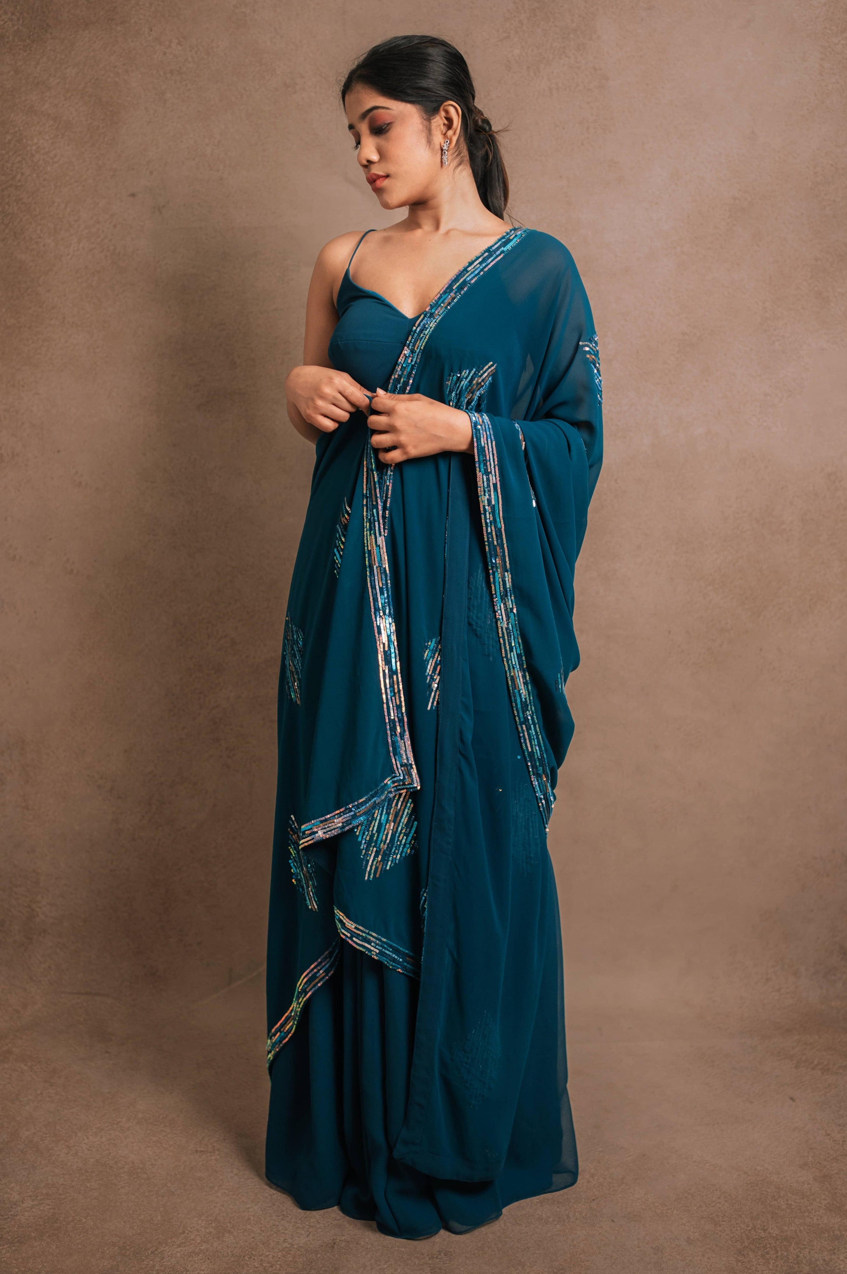 Showcasing dupatta design in an egyptian blue georgette anarkali-kurti, featuring a sleek slit, paired with an intricately handcrafted georgette dupatta by team Archana Karthick.