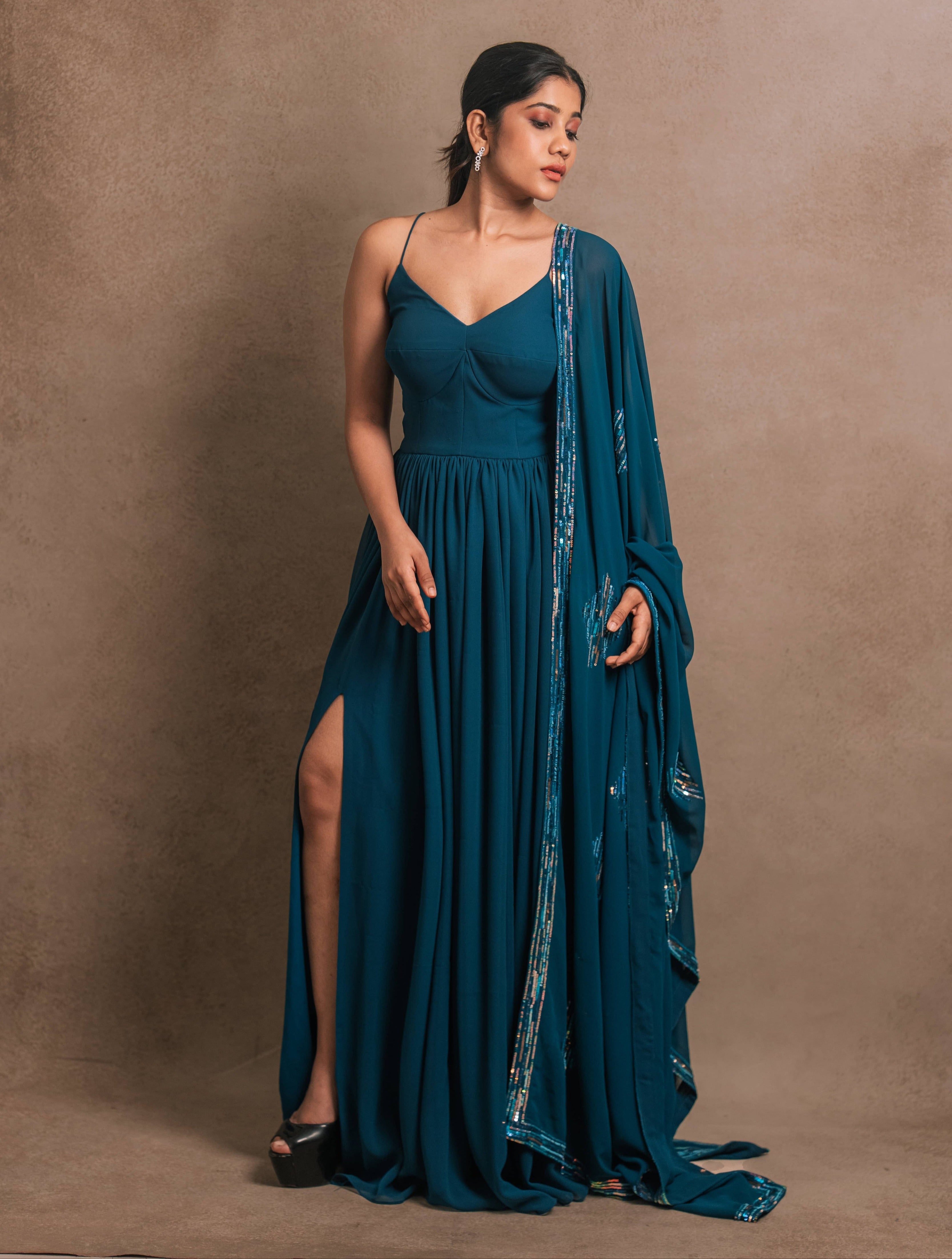 Showcasing slit design in an egyptian blue georgette anarkali-kurti, featuring a sleek slit, paired with an intricately handcrafted georgette dupatta by team Archana Karthick.