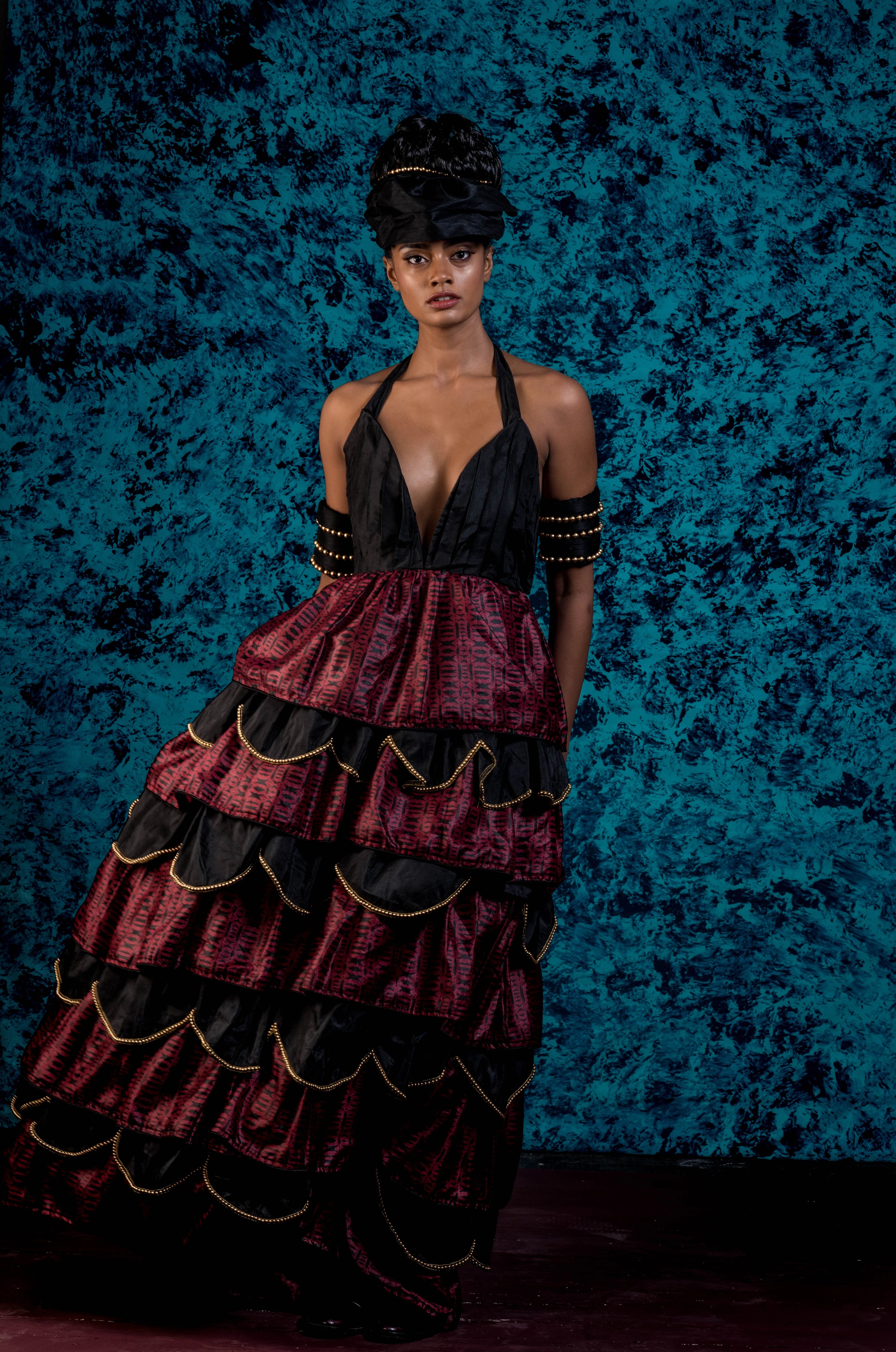 Supermodel Archana Akil Kumar in a noir halterneck gown with a multi-tiered scalloped look. Partywear Gown.