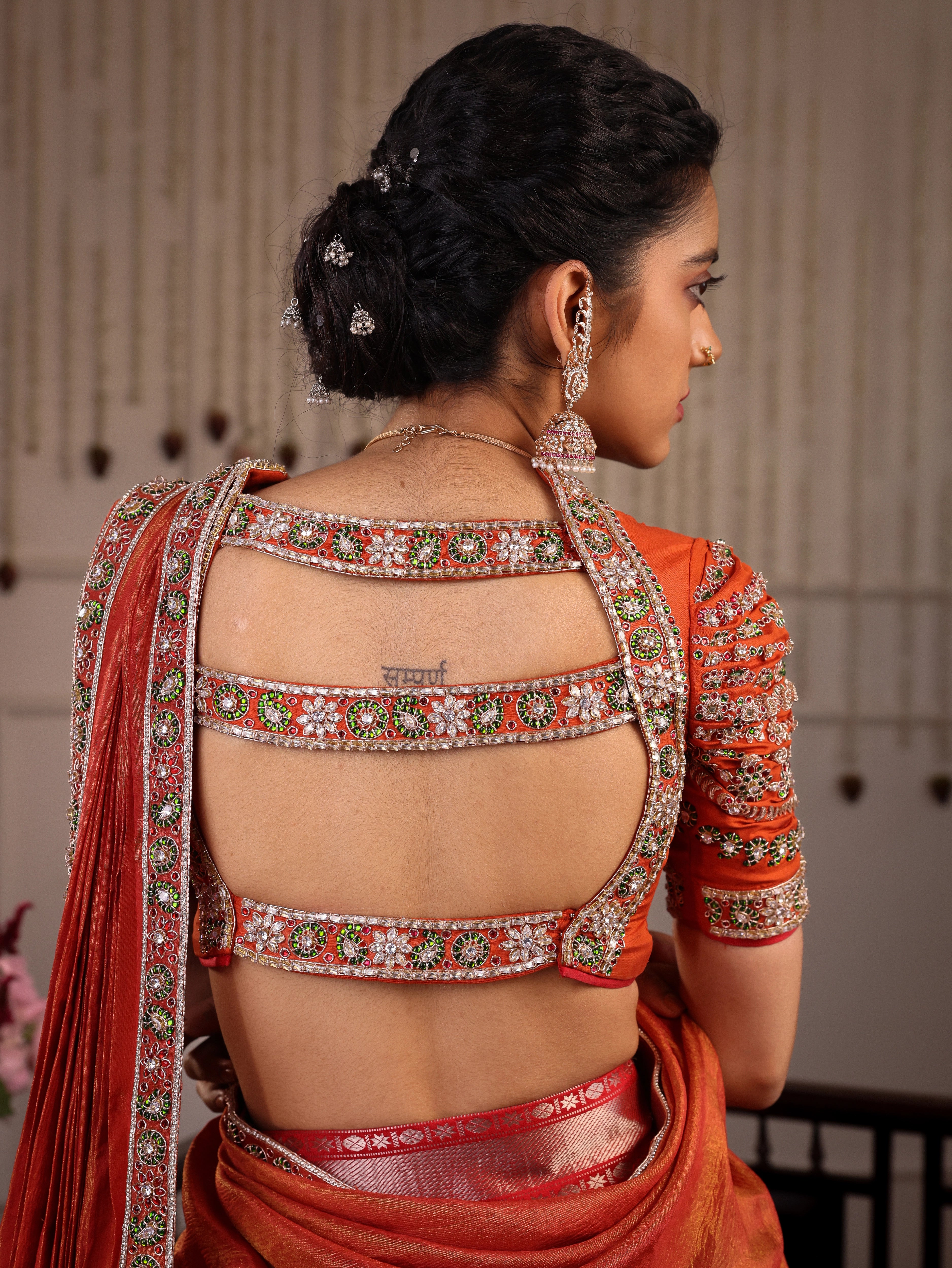 Model Himanshi in black & orange kanjeevaram silk half saree with vummidi bangaru jewllery
