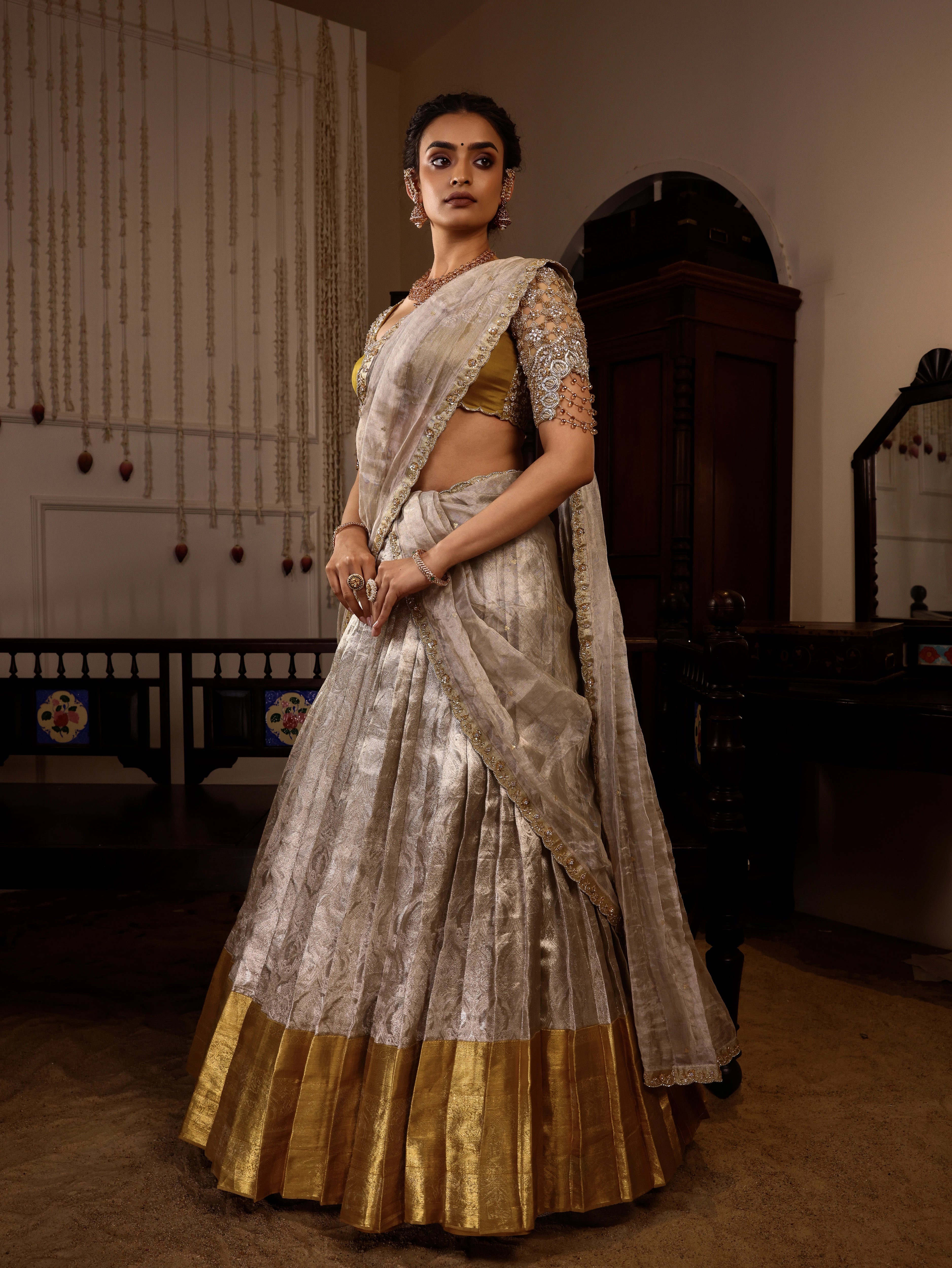Model Sanskriti Mishra in gold & silver kanjeevaram silk half saree with vummidi bangaru jewllery