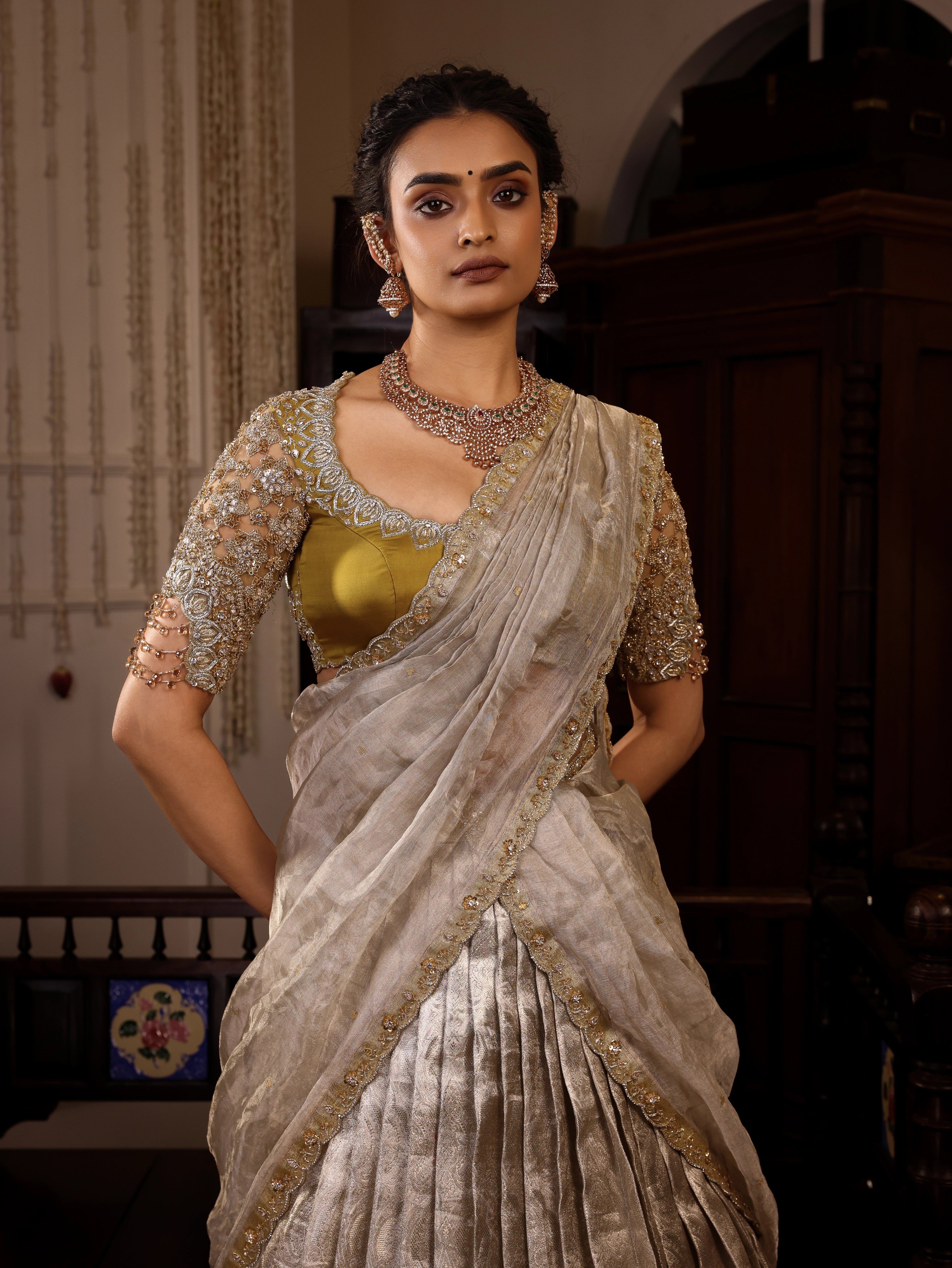 Model Sanskriti Mishra poses in a gold and silver kanjeevaram silk half saree with vummidi bangaru jewllery